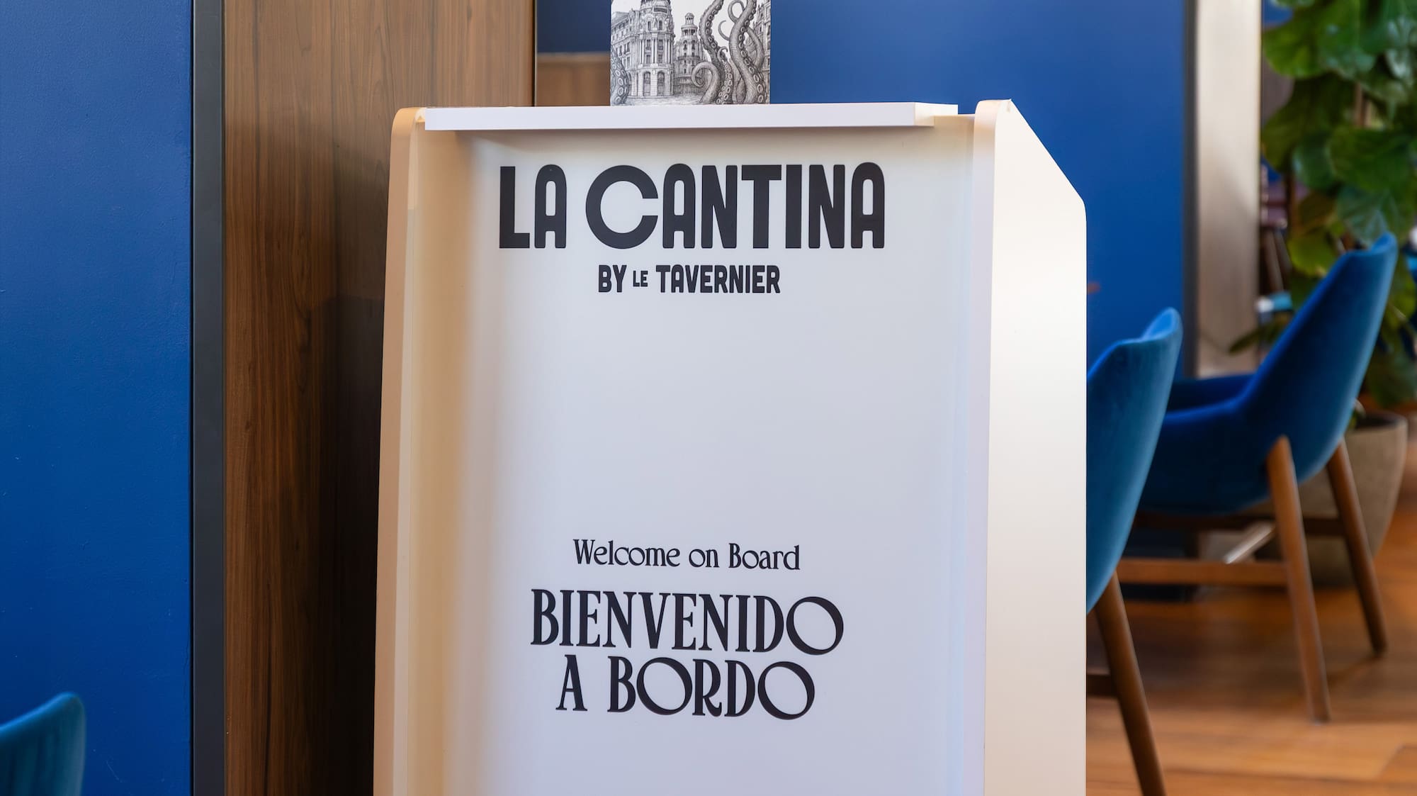 a white podium with a sign on it