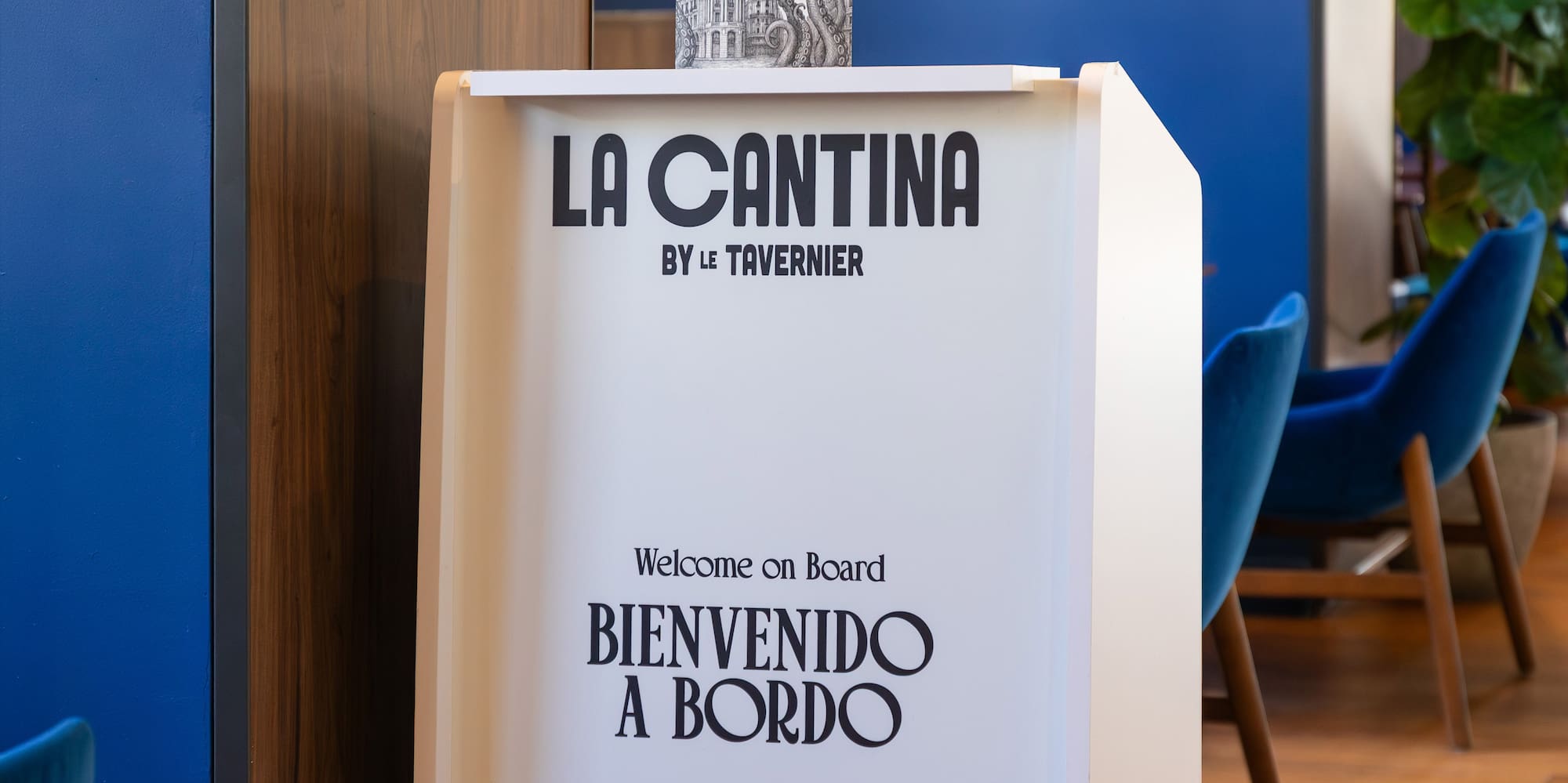 a white podium with a sign on it