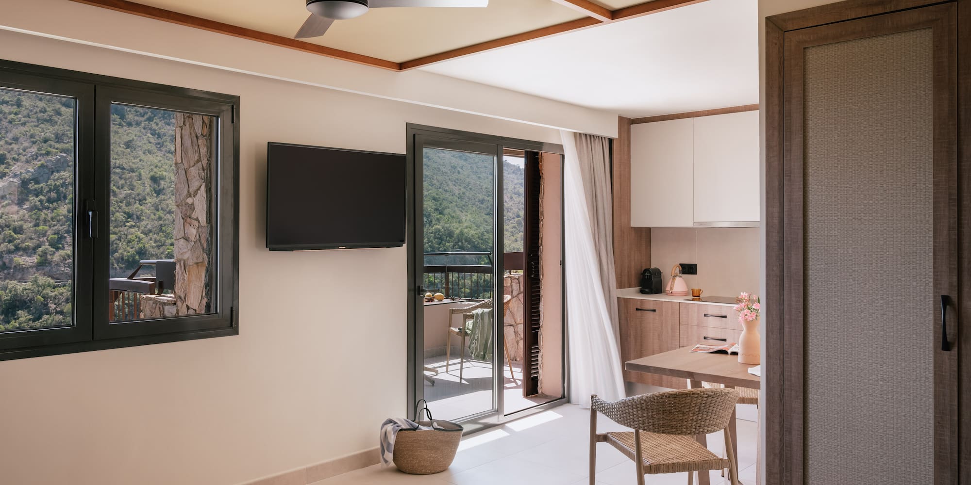 a room with a television and a table