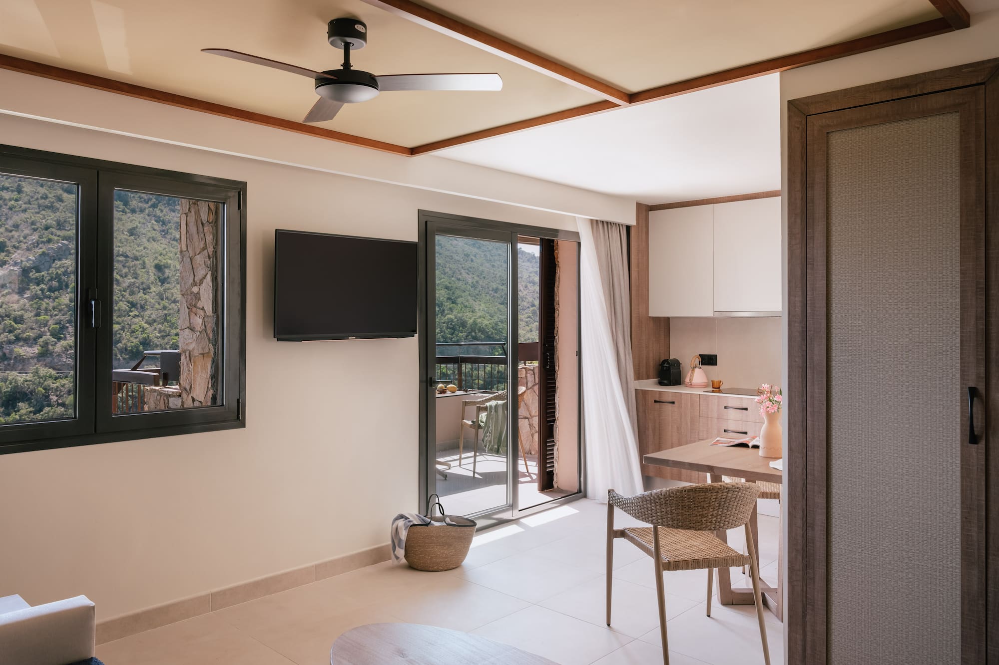 a room with a television and a table