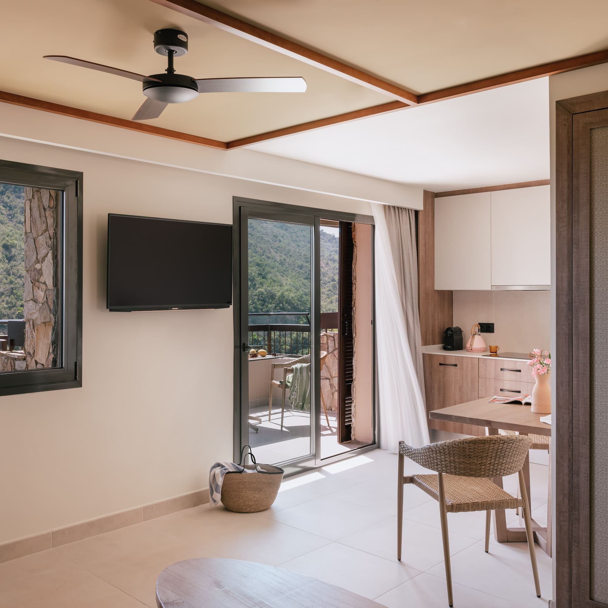 a room with a television and a table
