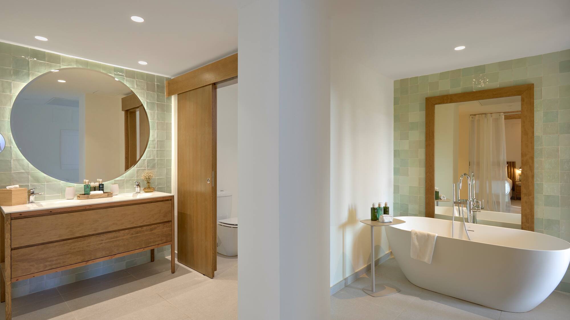 a bathroom with a tub and a mirror