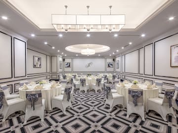 a room with tables and chairs