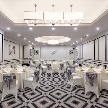 a room with tables and chairs