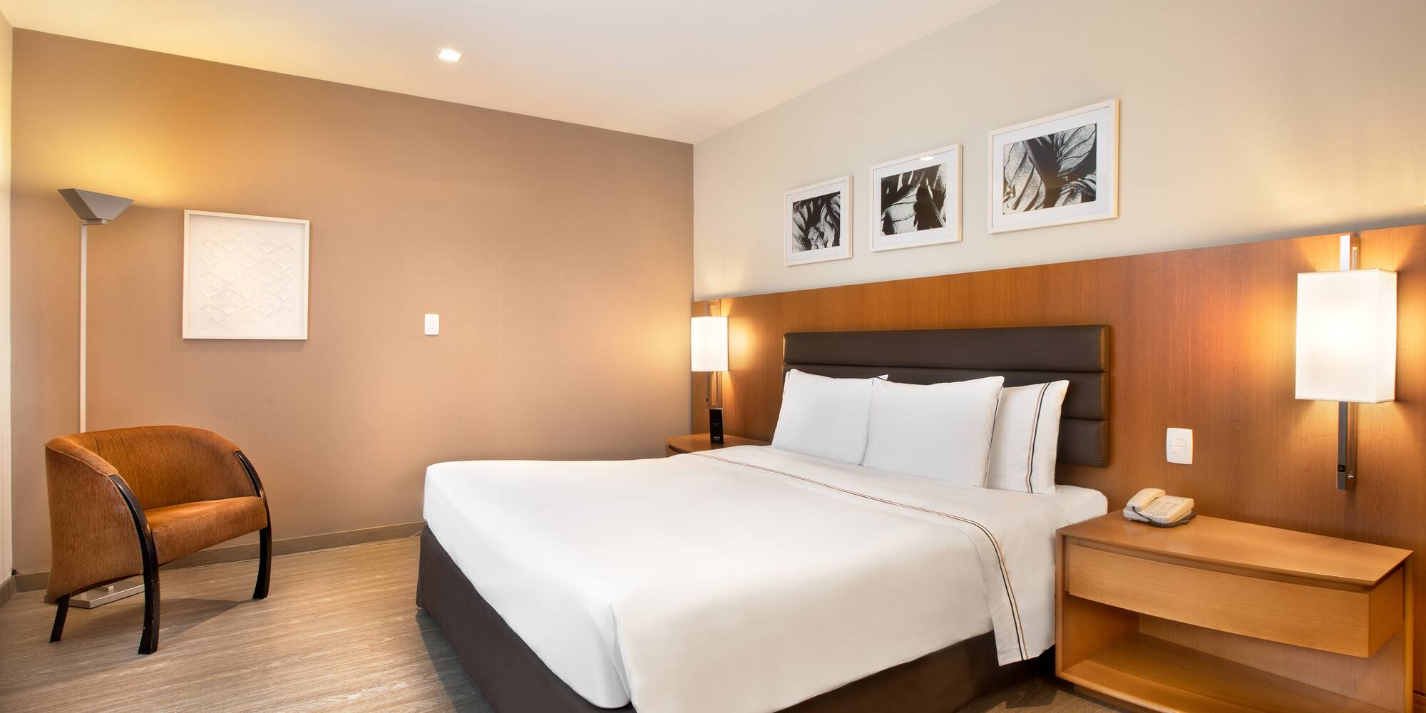 a room with a bed and a chair