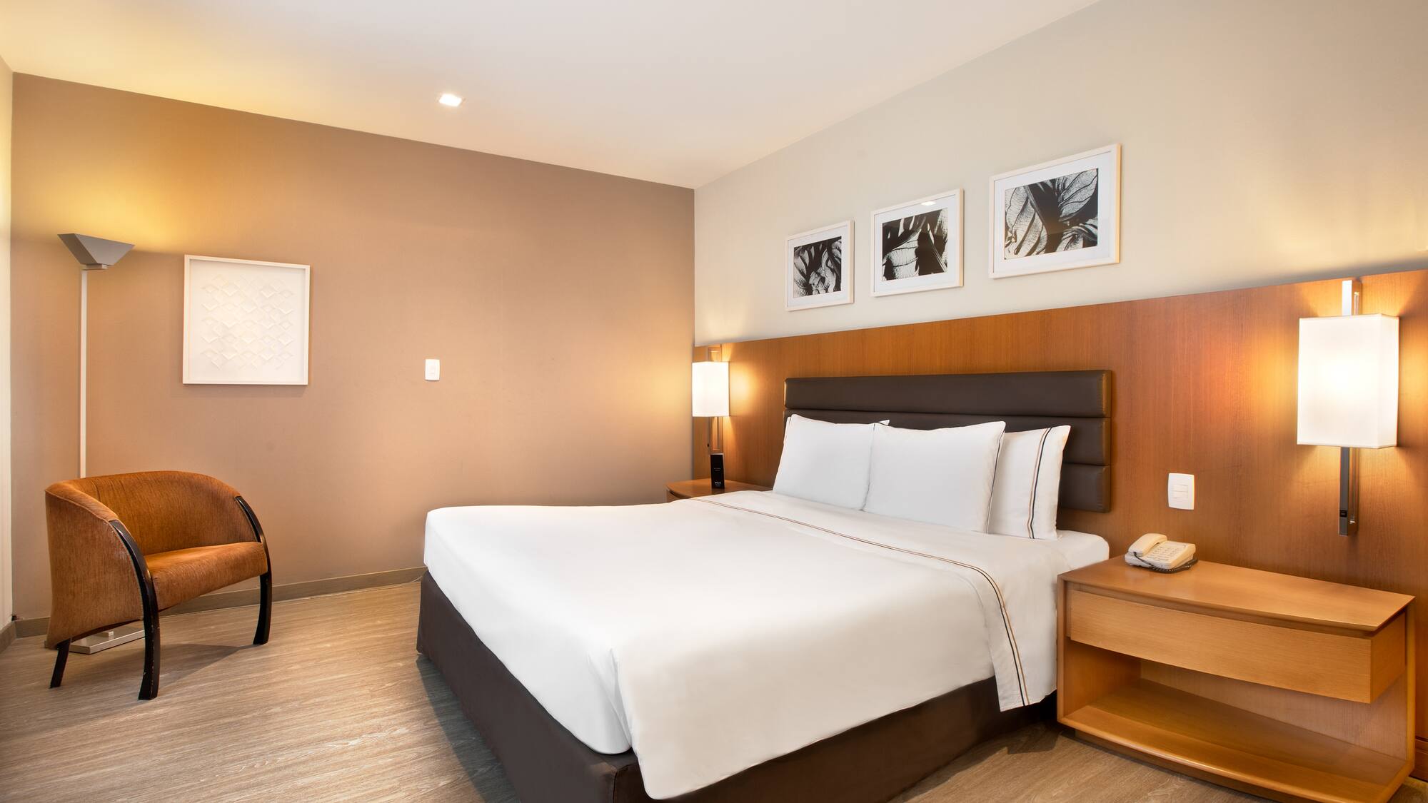 a room with a bed and a chair