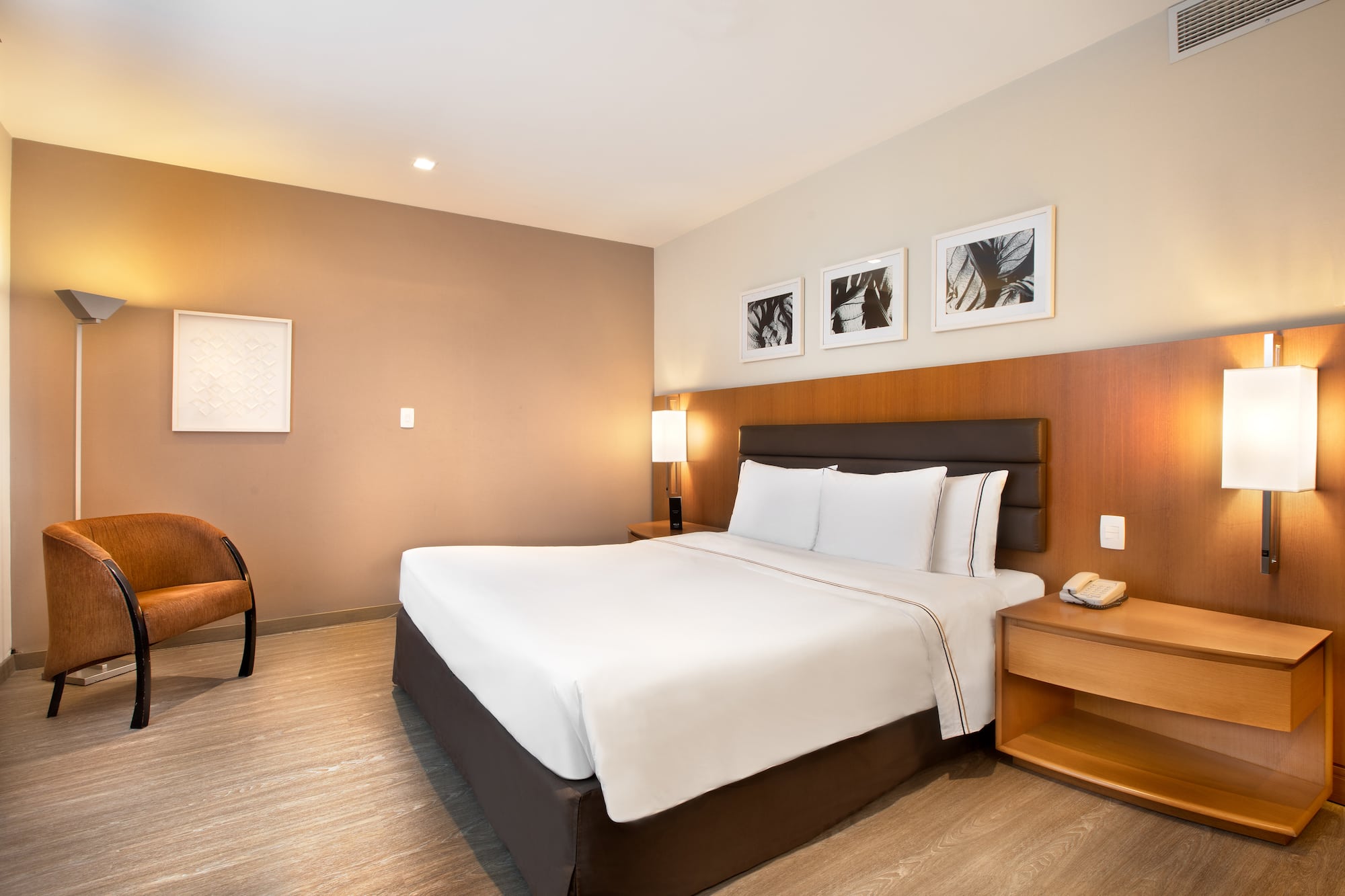 a room with a bed and a chair