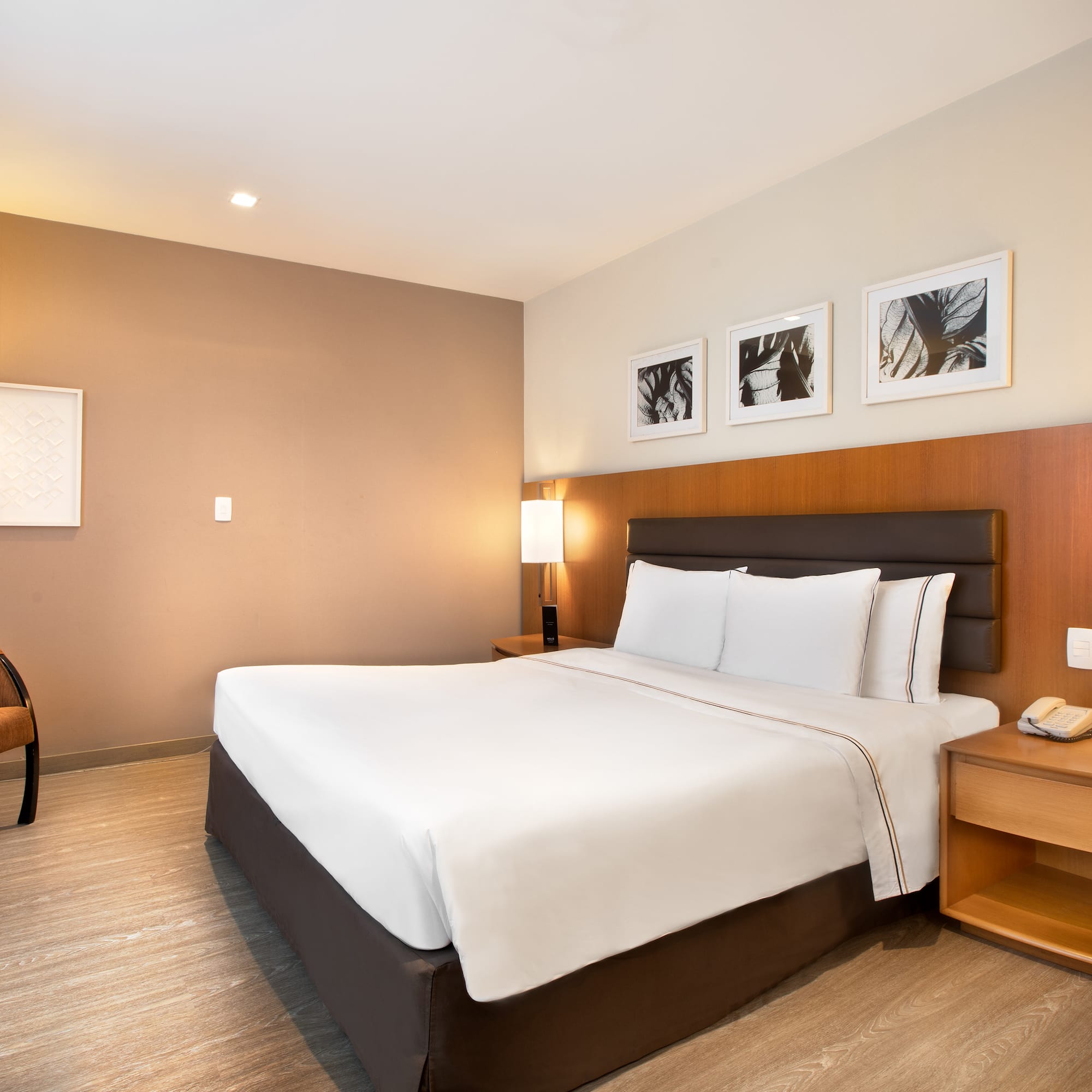 a room with a bed and a chair