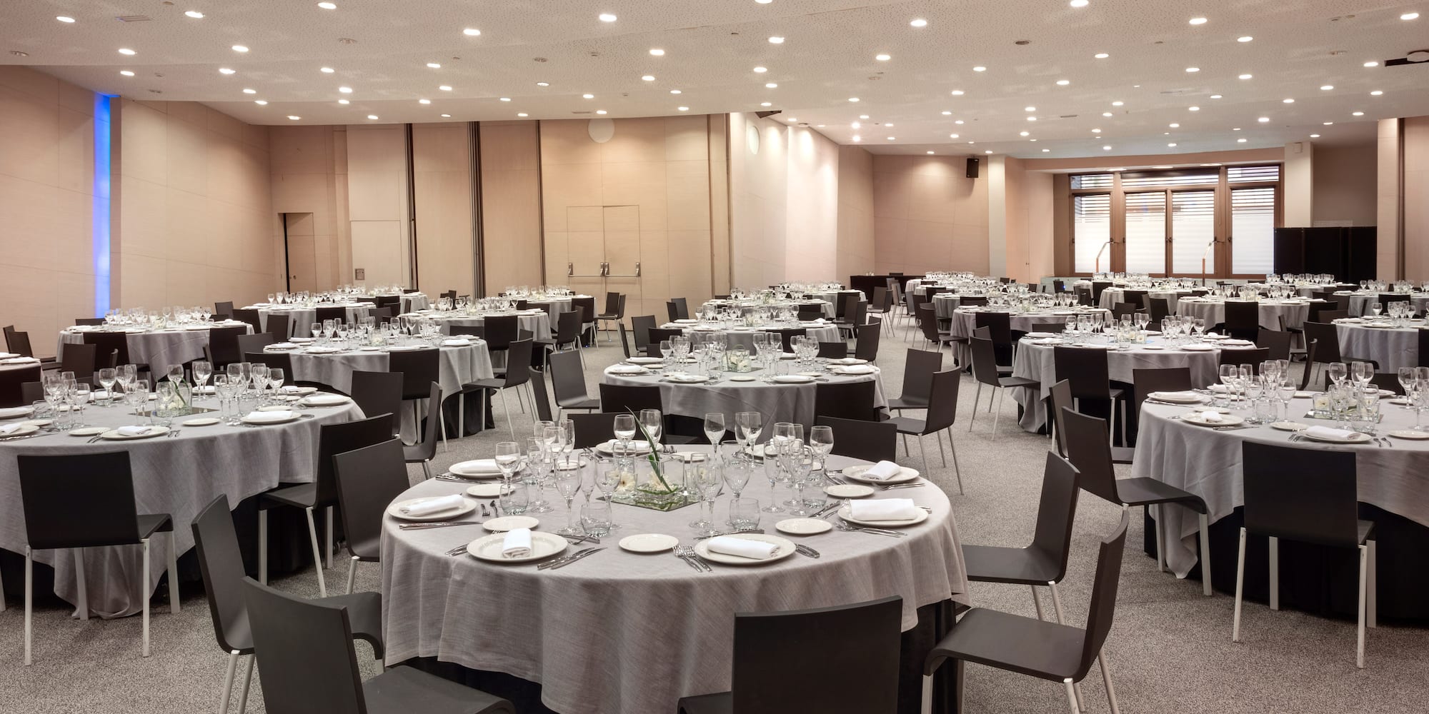 a large room with tables and chairs