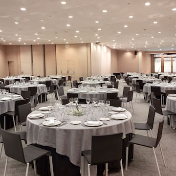 a large room with tables and chairs