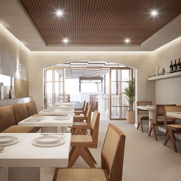 a room with tables and chairs