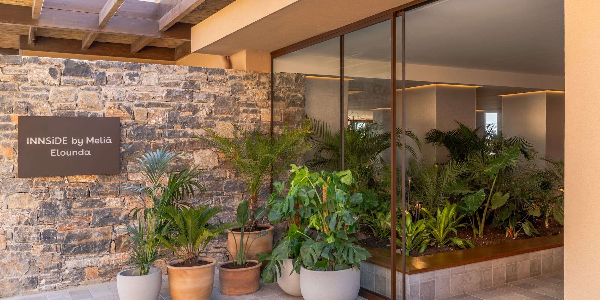 a building with plants in pots