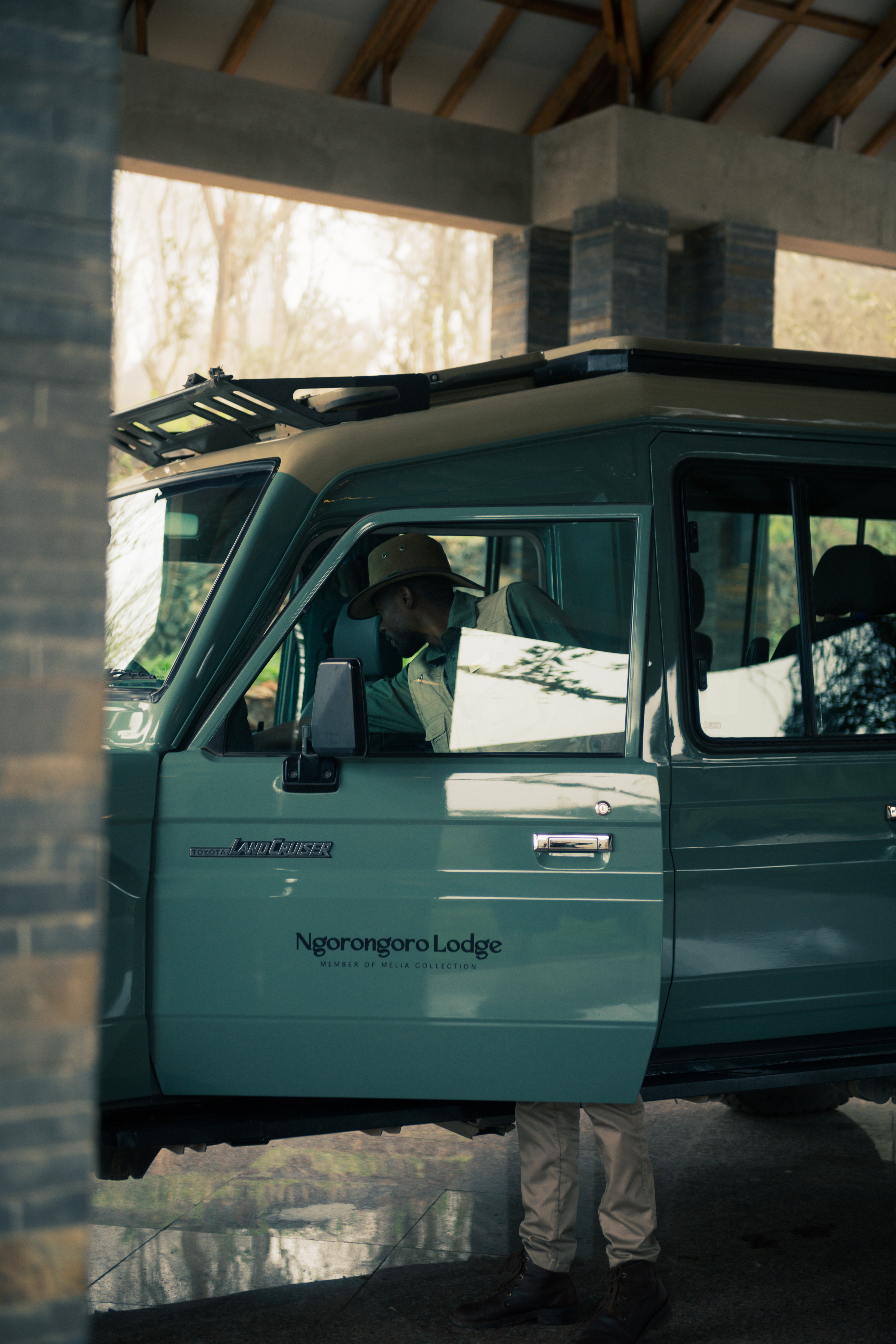 Ngorongoro Lodge safari Land Cruiser with driver.