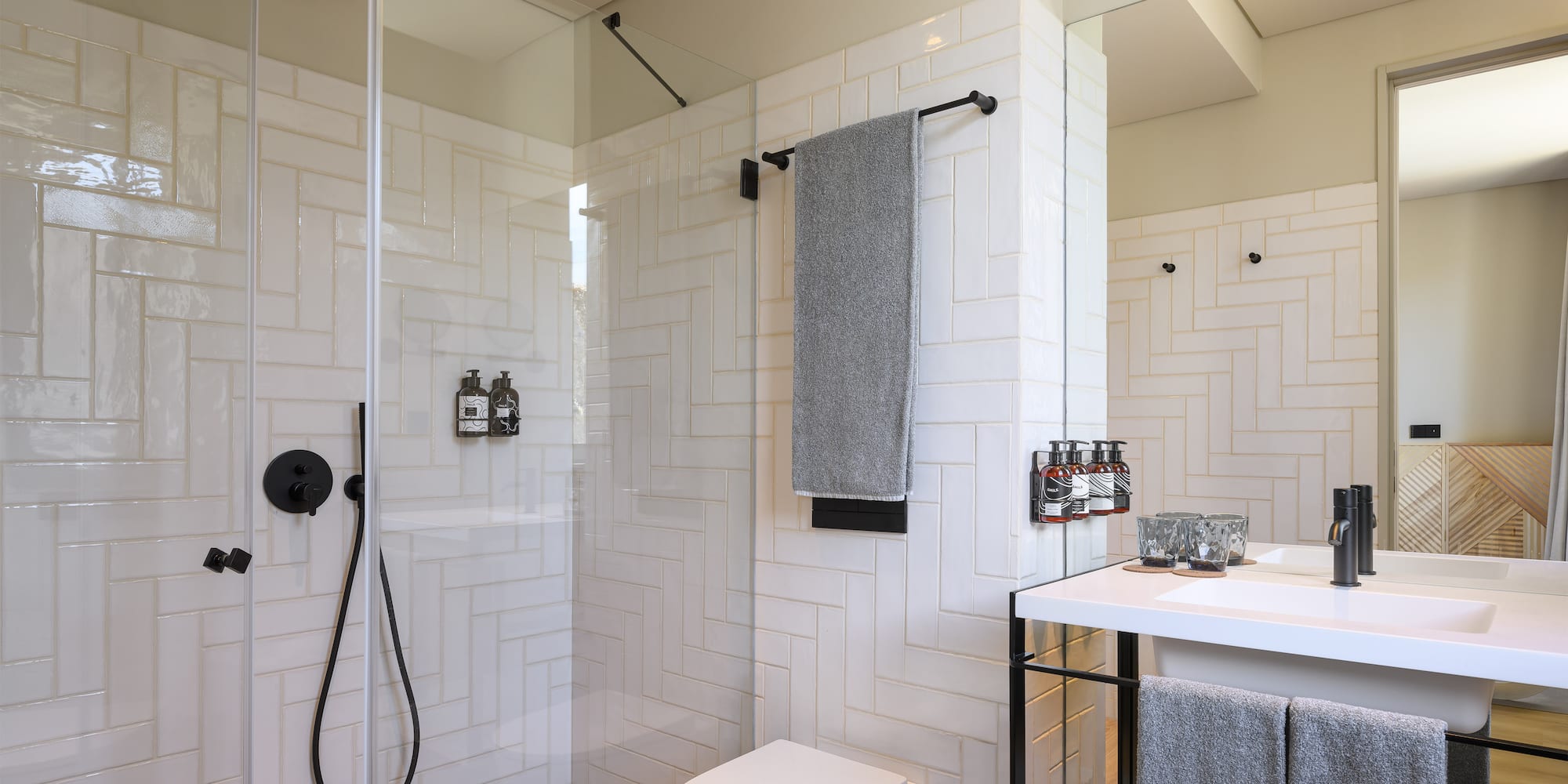 a bathroom with a shower and toilet