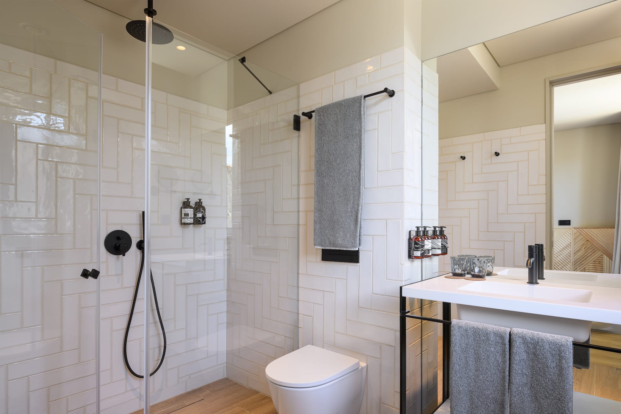 a bathroom with a shower and toilet
