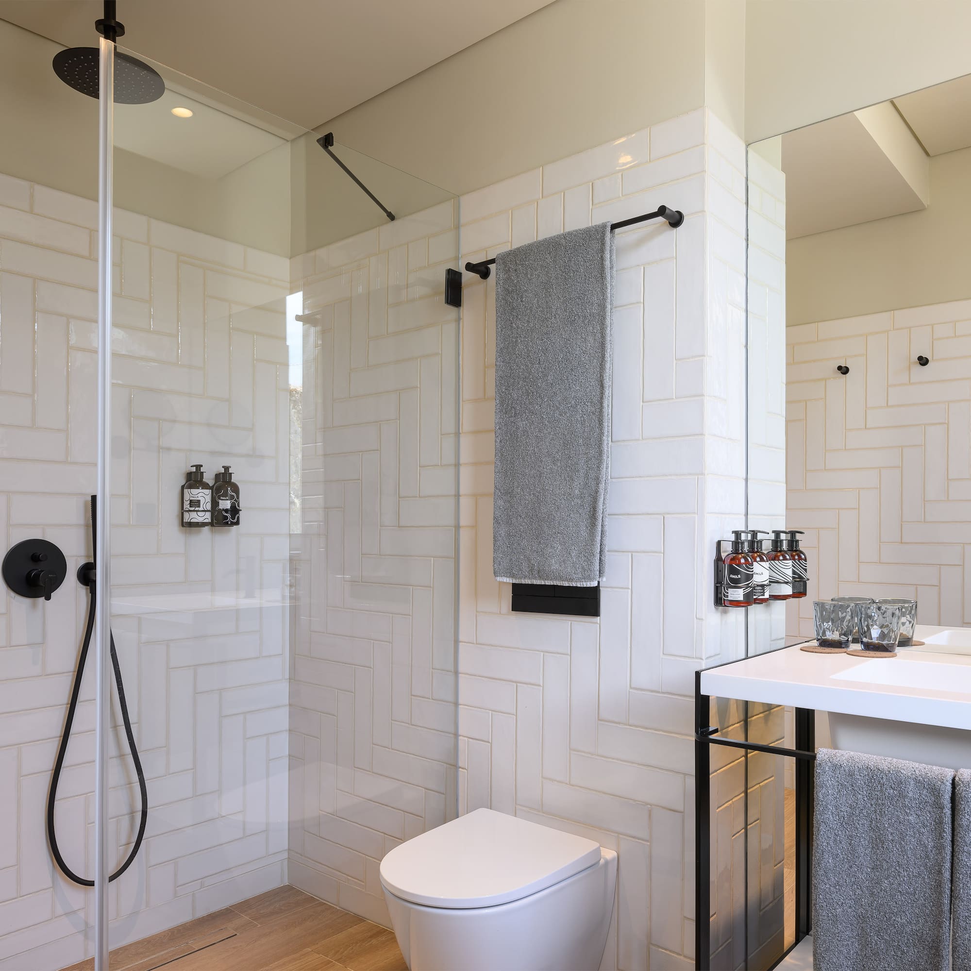 a bathroom with a shower and toilet