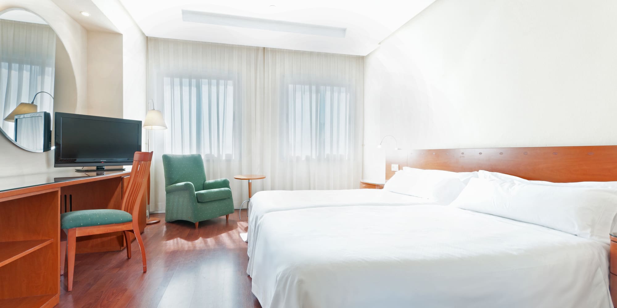 a room with a bed and a chair