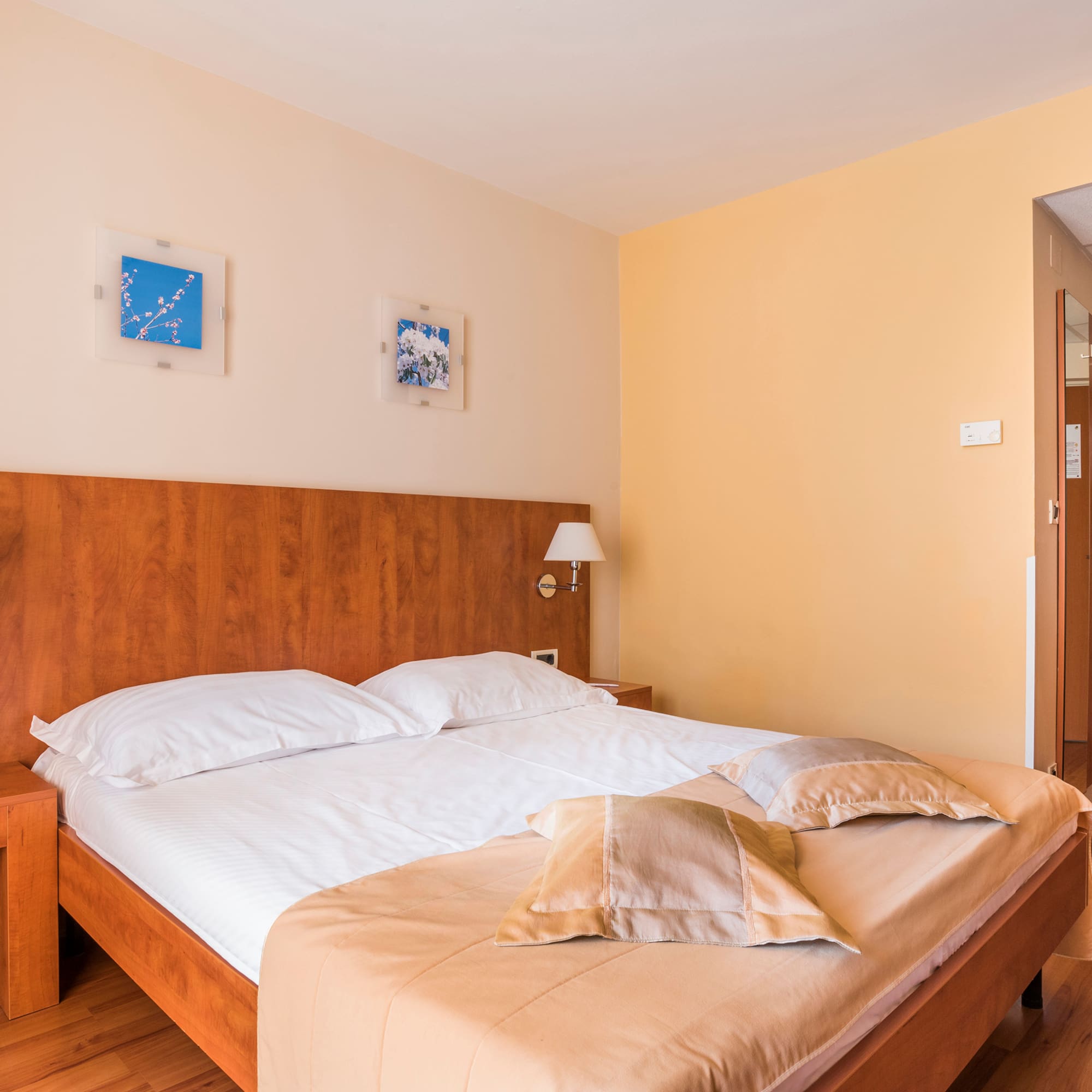 a bed with pillows on it