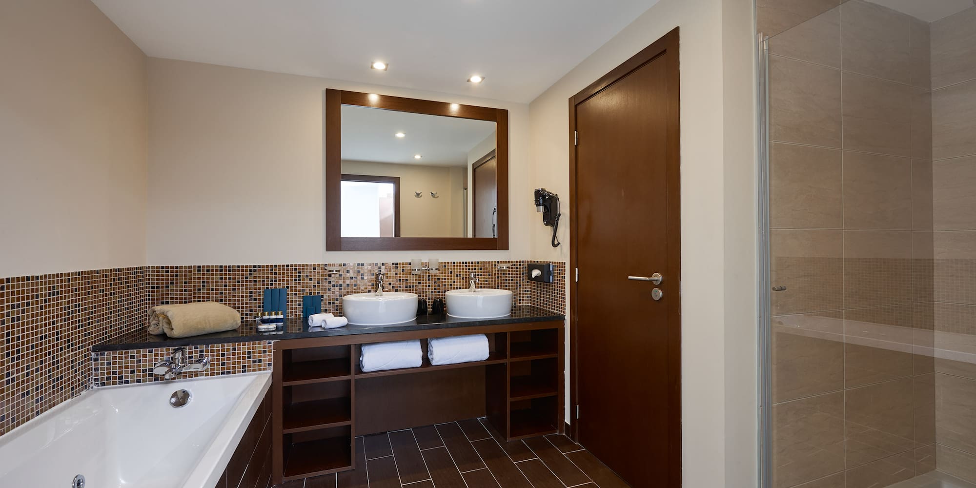 a bathroom with a bathtub and sink