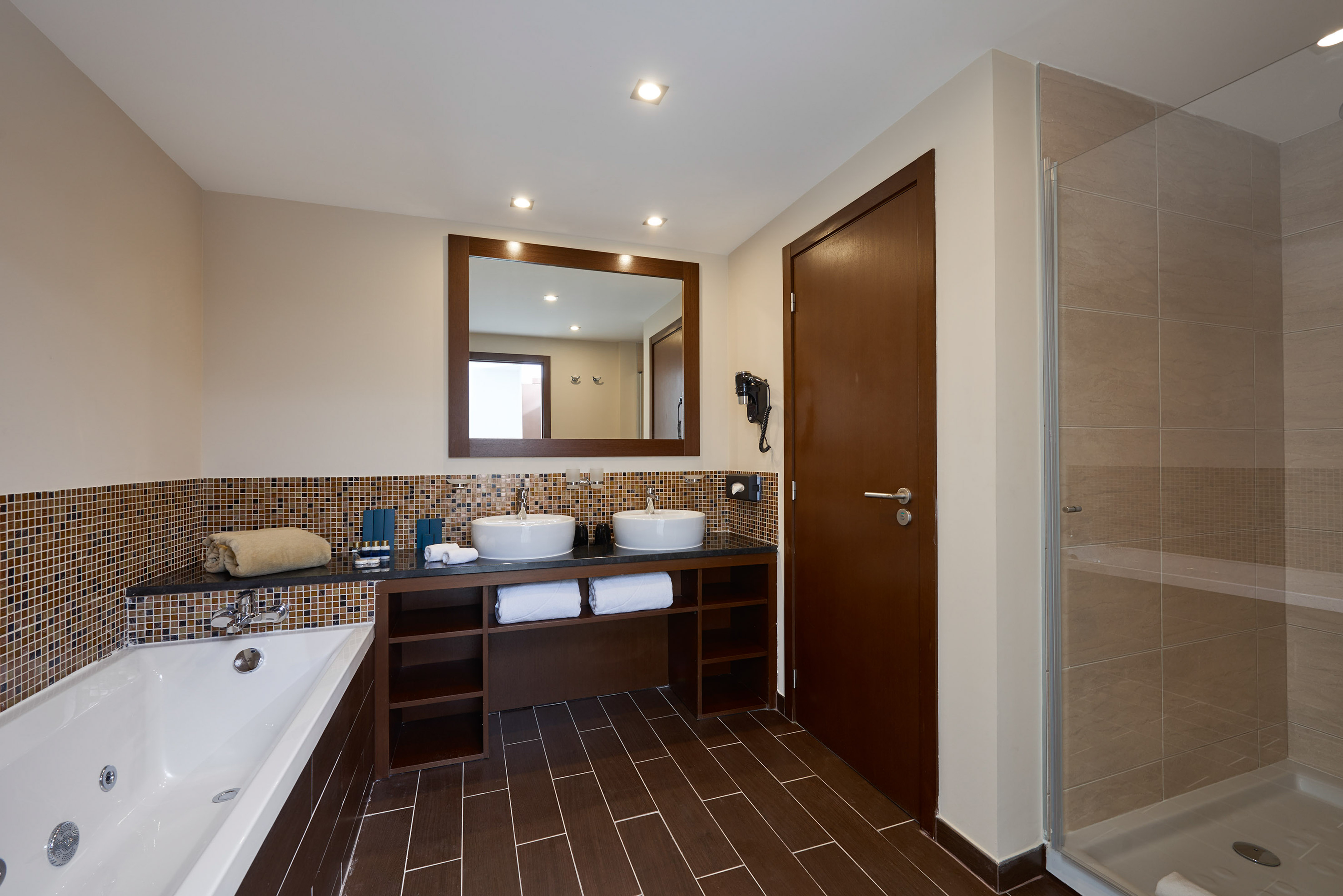 a bathroom with a bathtub and sink