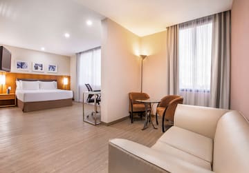 a room with a bed and a table