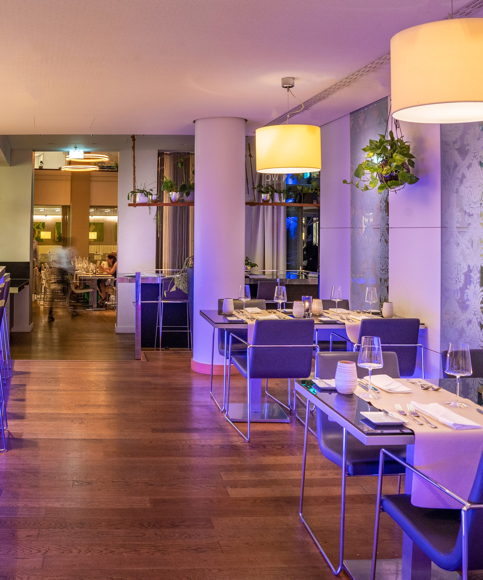 a restaurant with tables and chairs