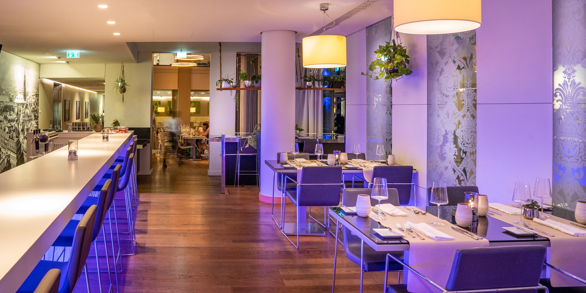 a restaurant with tables and chairs