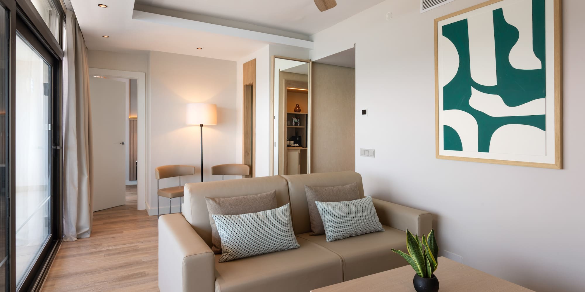 a living room with a couch and a table