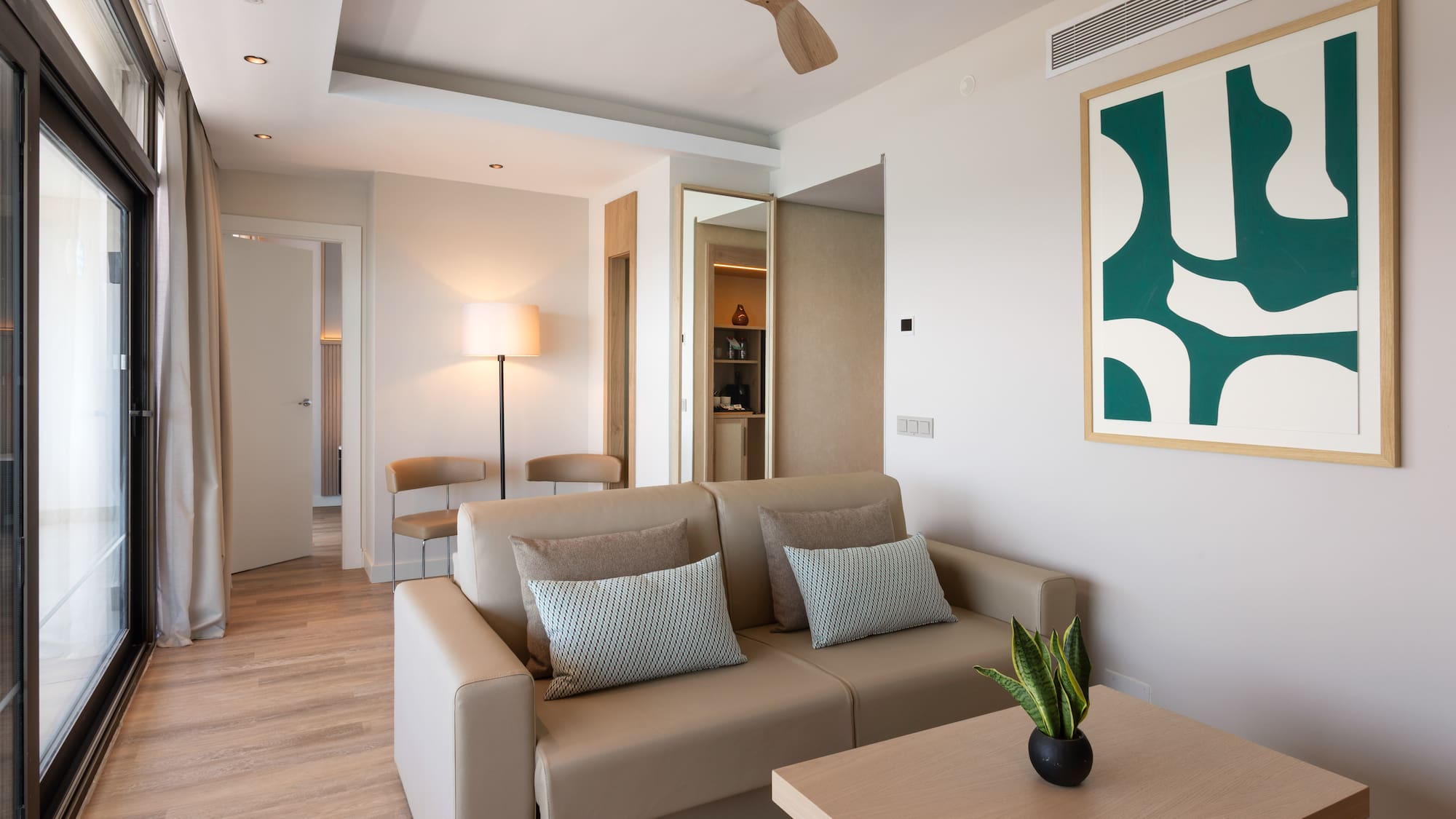 a living room with a couch and a table