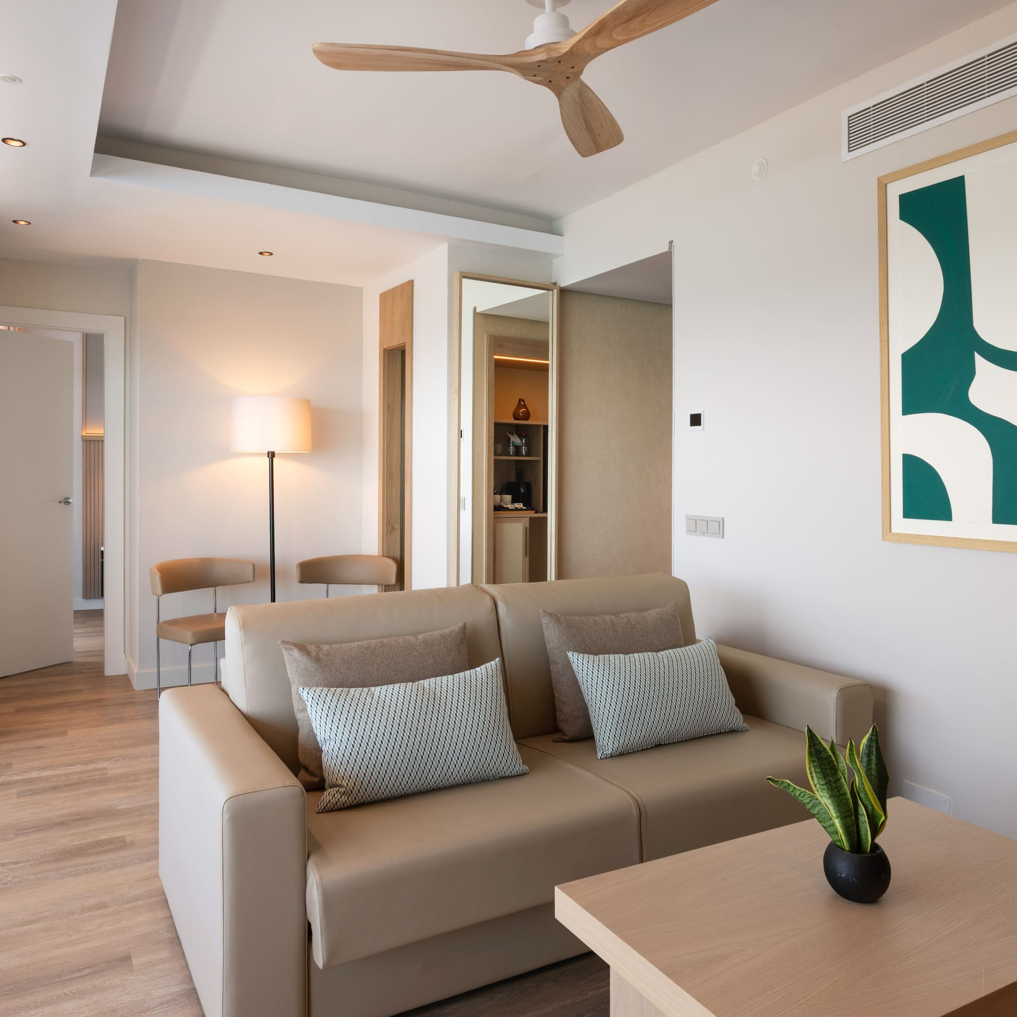 a living room with a couch and a table