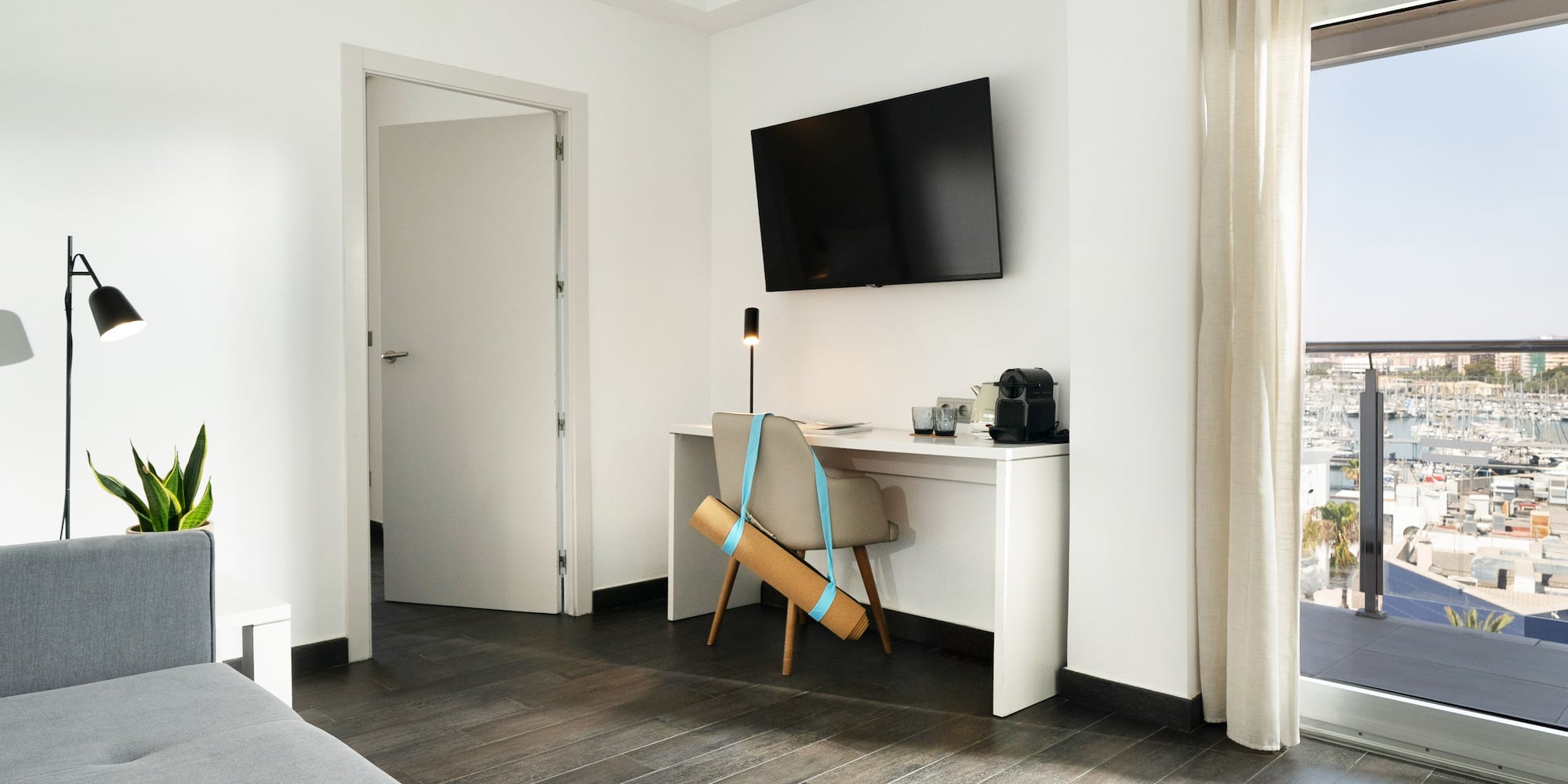 a room with a tv and a chair