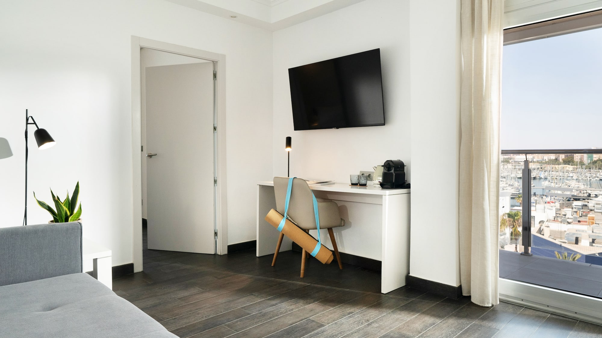 a room with a tv and a chair