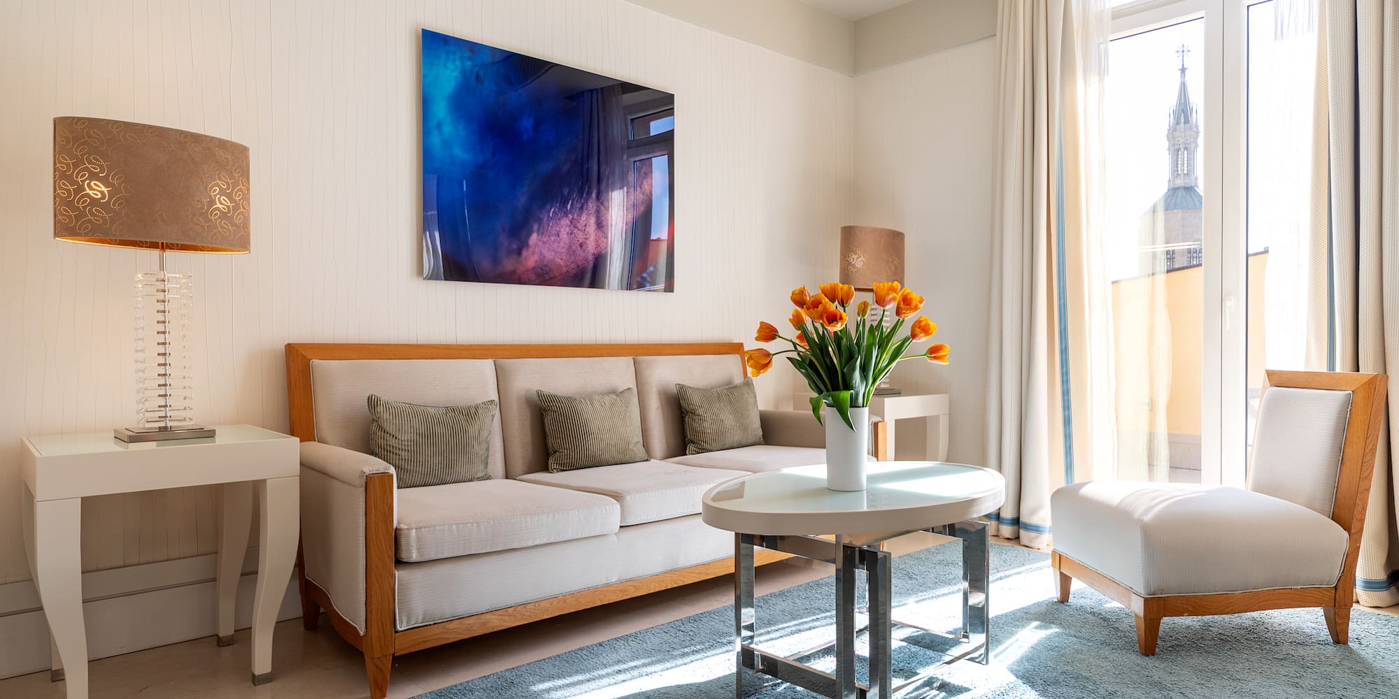 a living room with a couch and a table