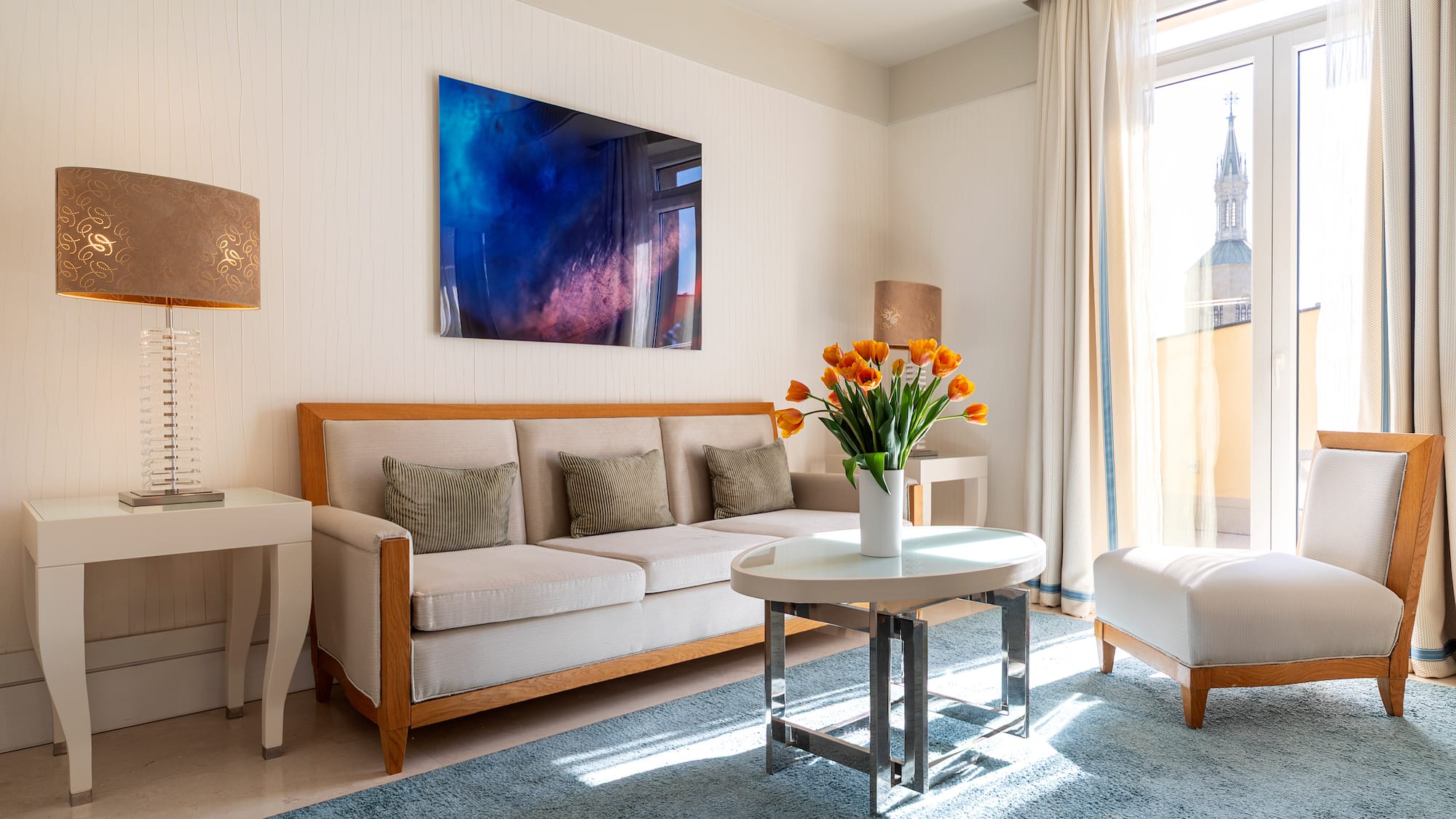 a living room with a couch and a table