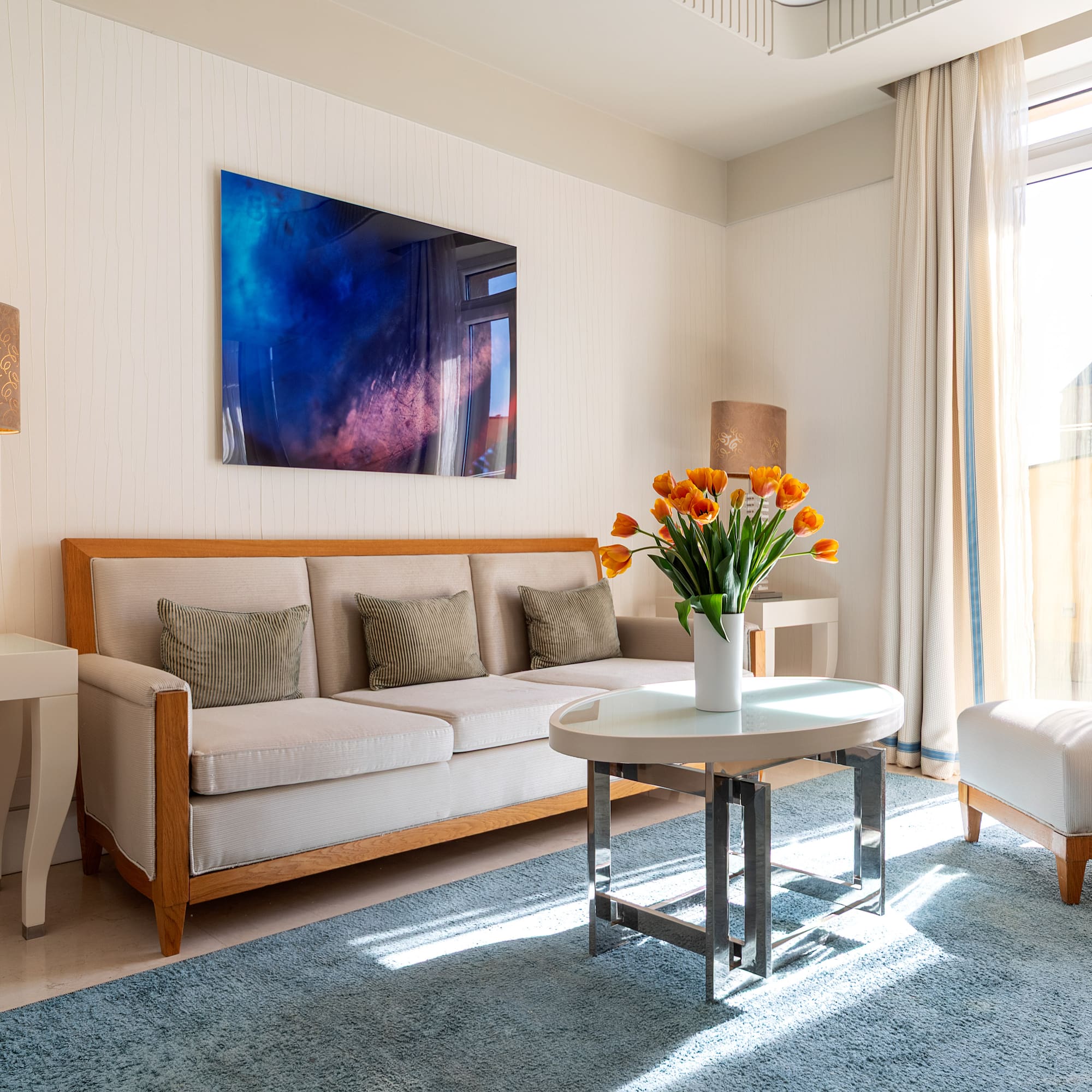 a living room with a couch and a table