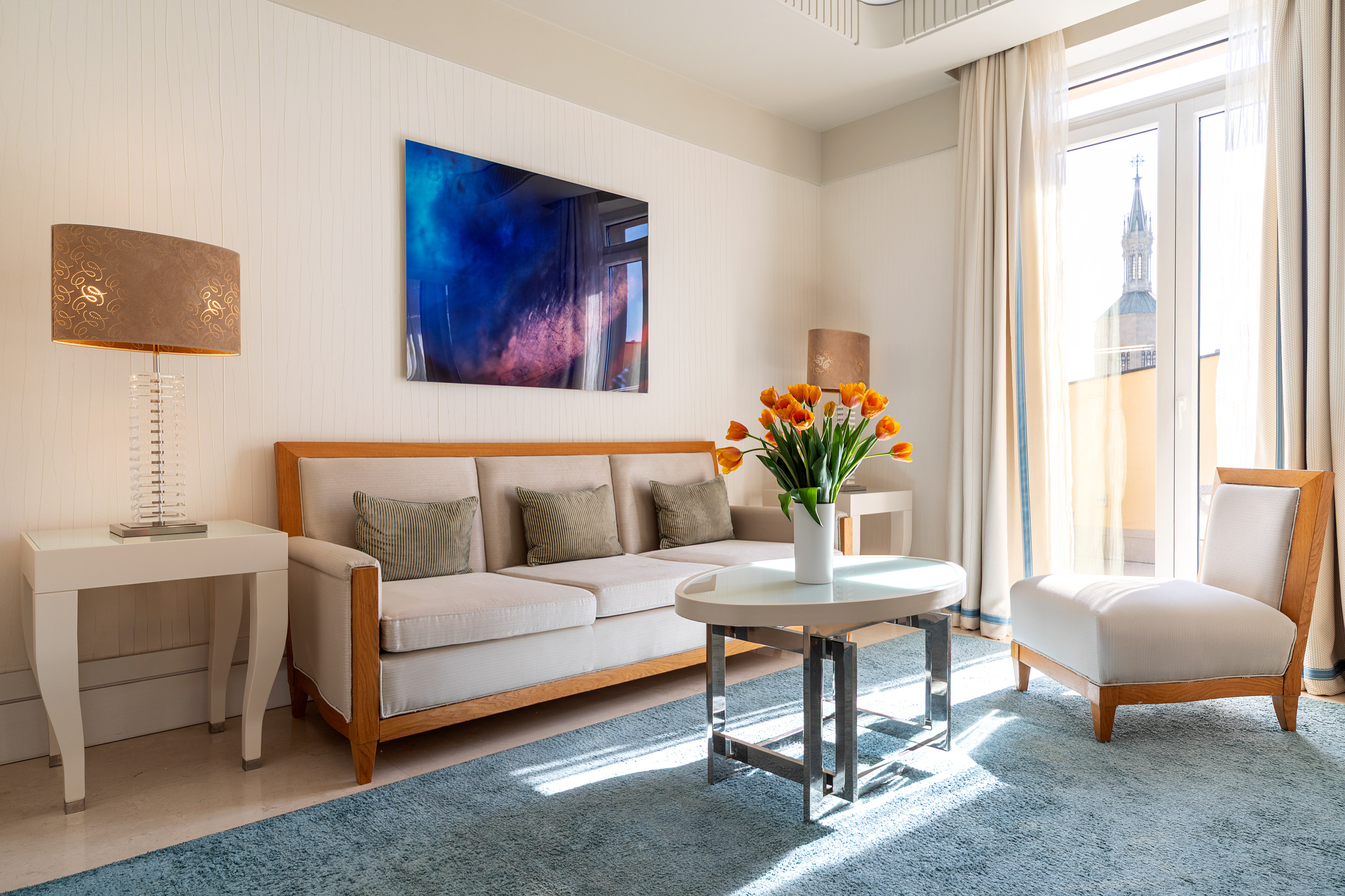 a living room with a couch and a table