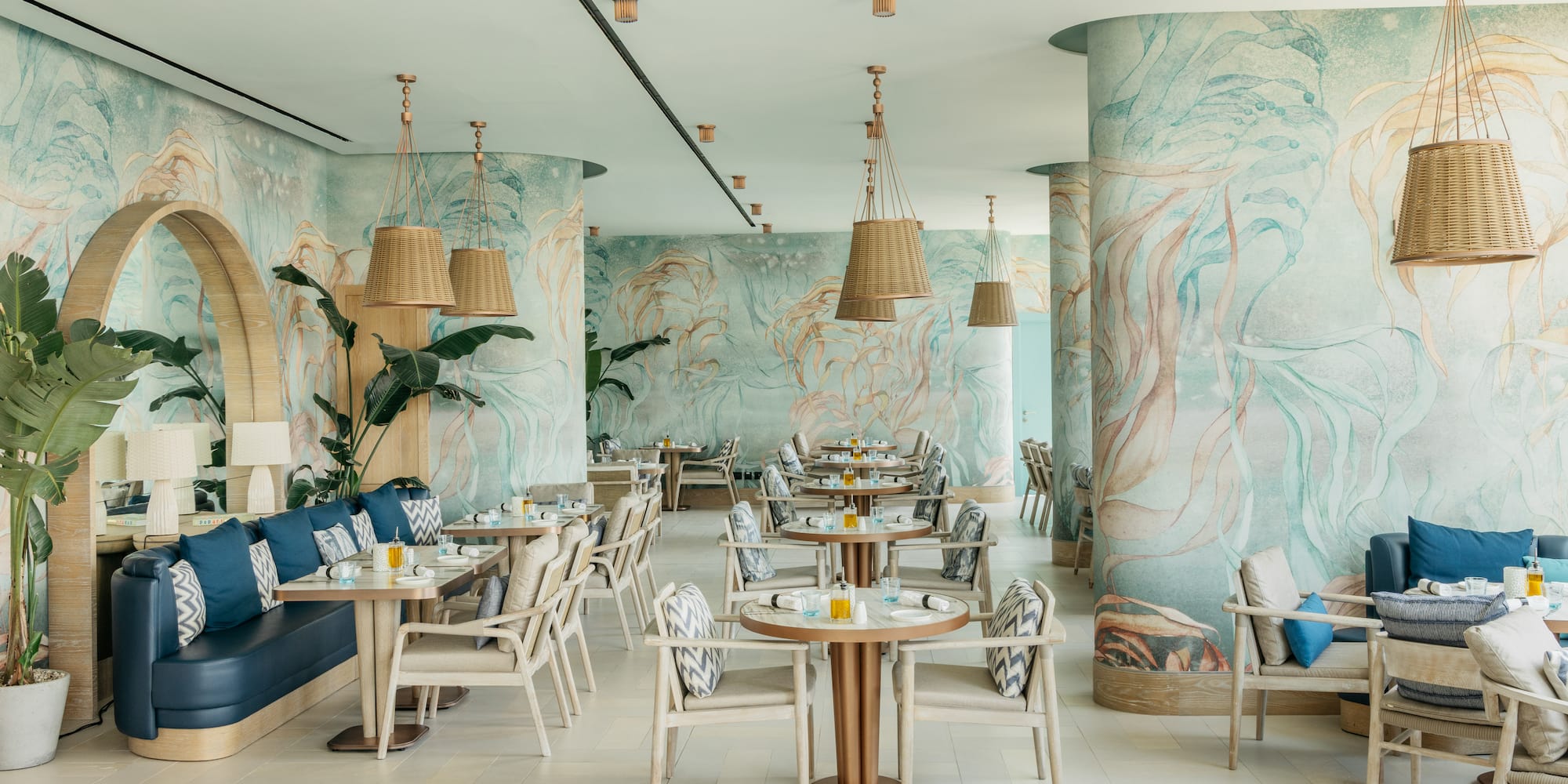 a restaurant with tables and chairs