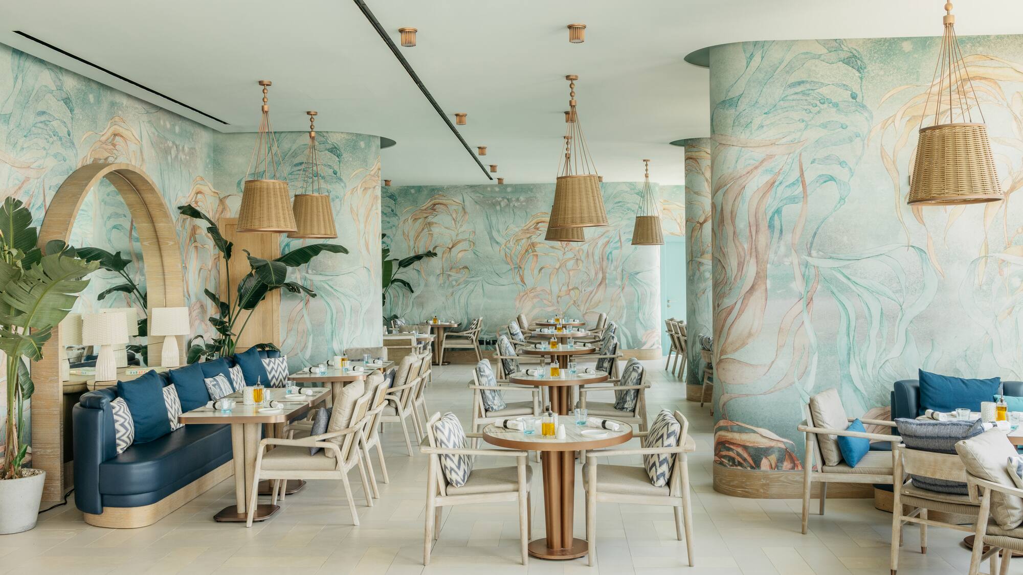 a restaurant with tables and chairs