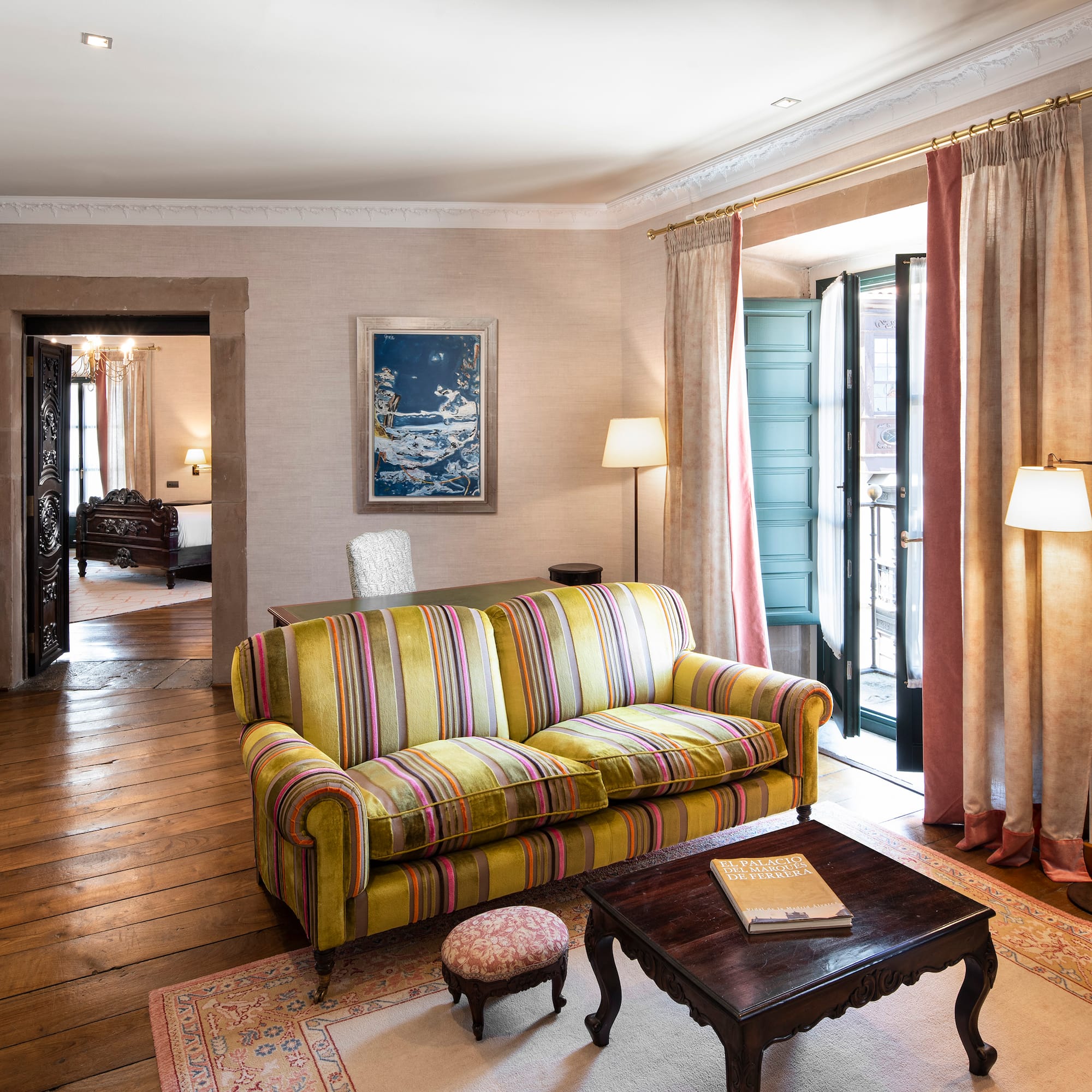 a living room with a couch and a table