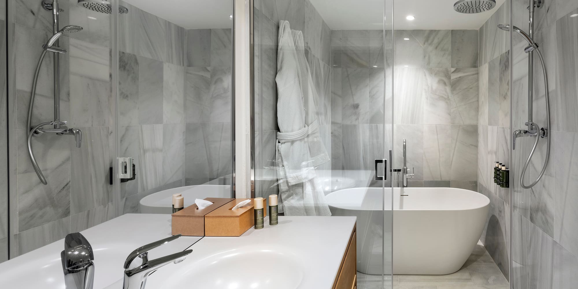 a bathroom with a bathtub and shower