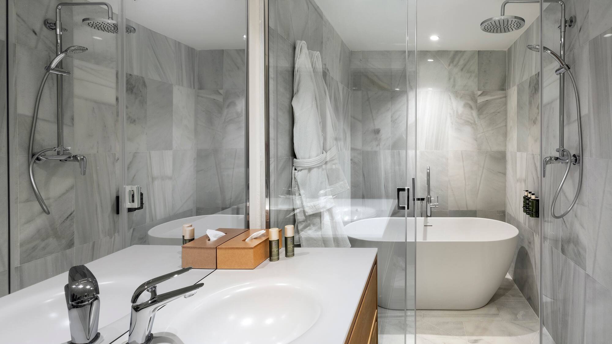 a bathroom with a bathtub and shower