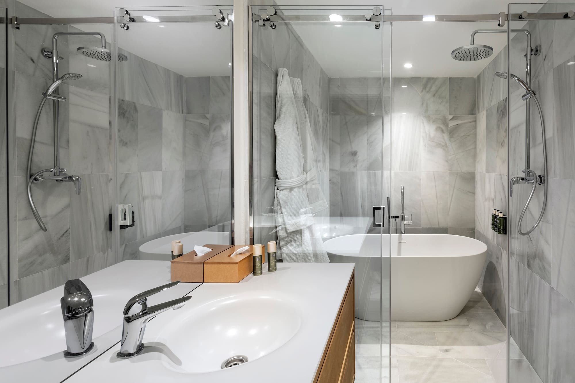 a bathroom with a bathtub and shower