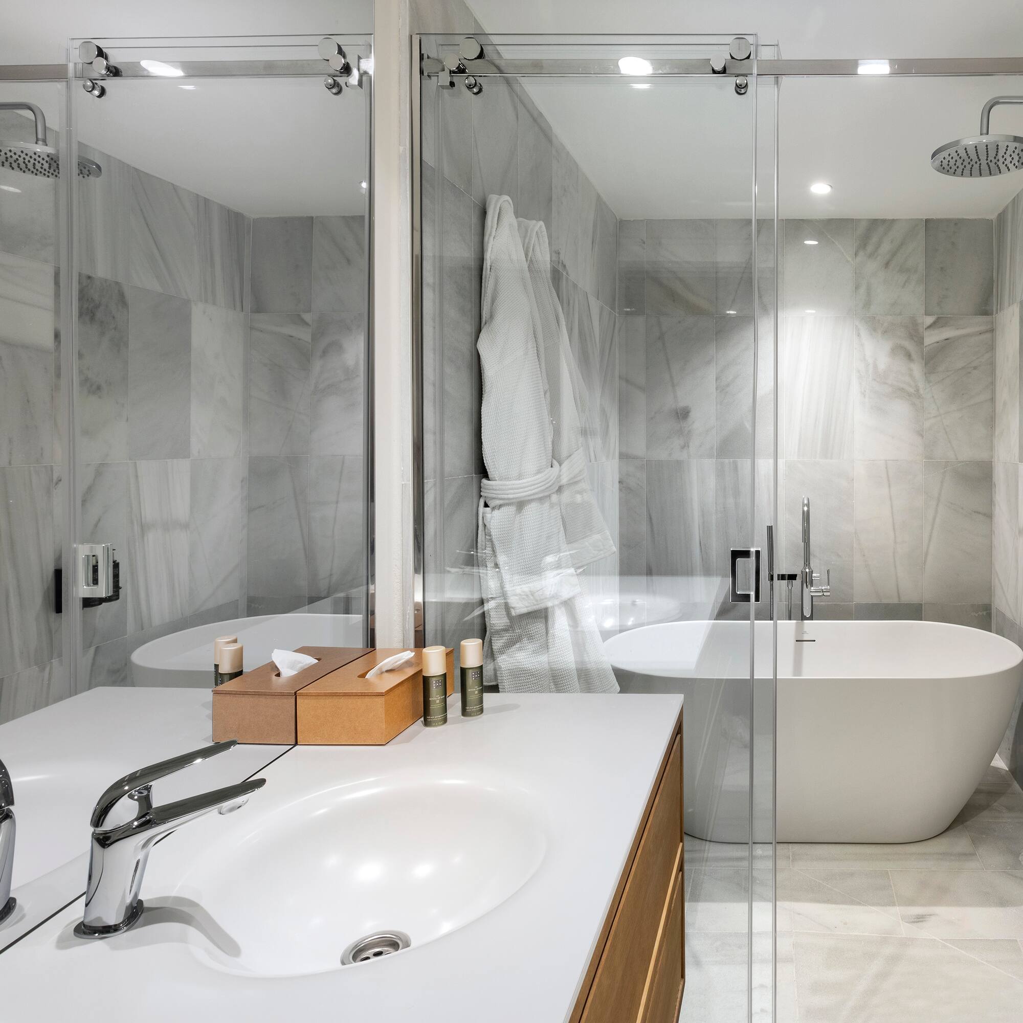 a bathroom with a bathtub and shower