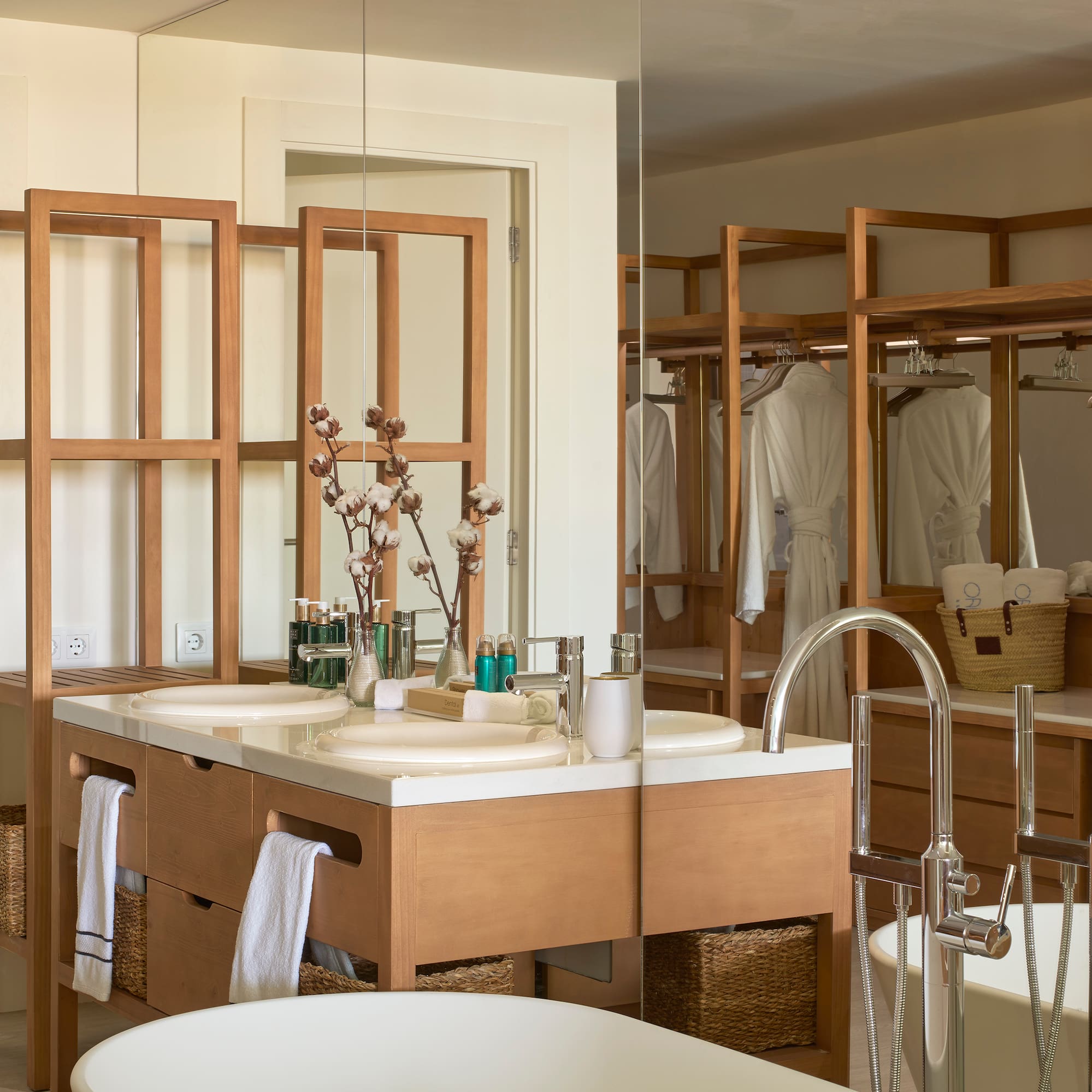a bathroom with a large mirror and a sink