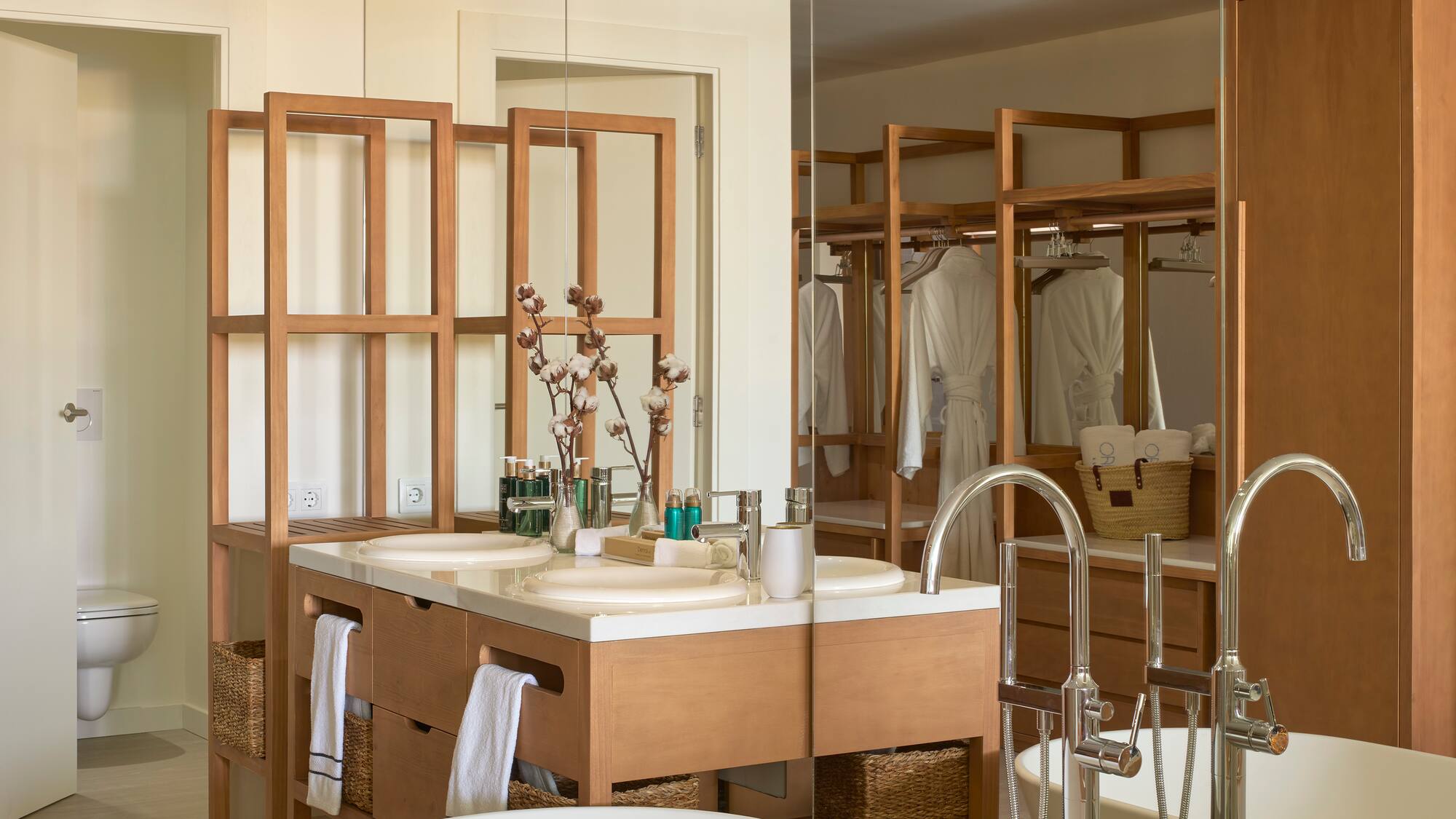 a bathroom with a large mirror and a sink