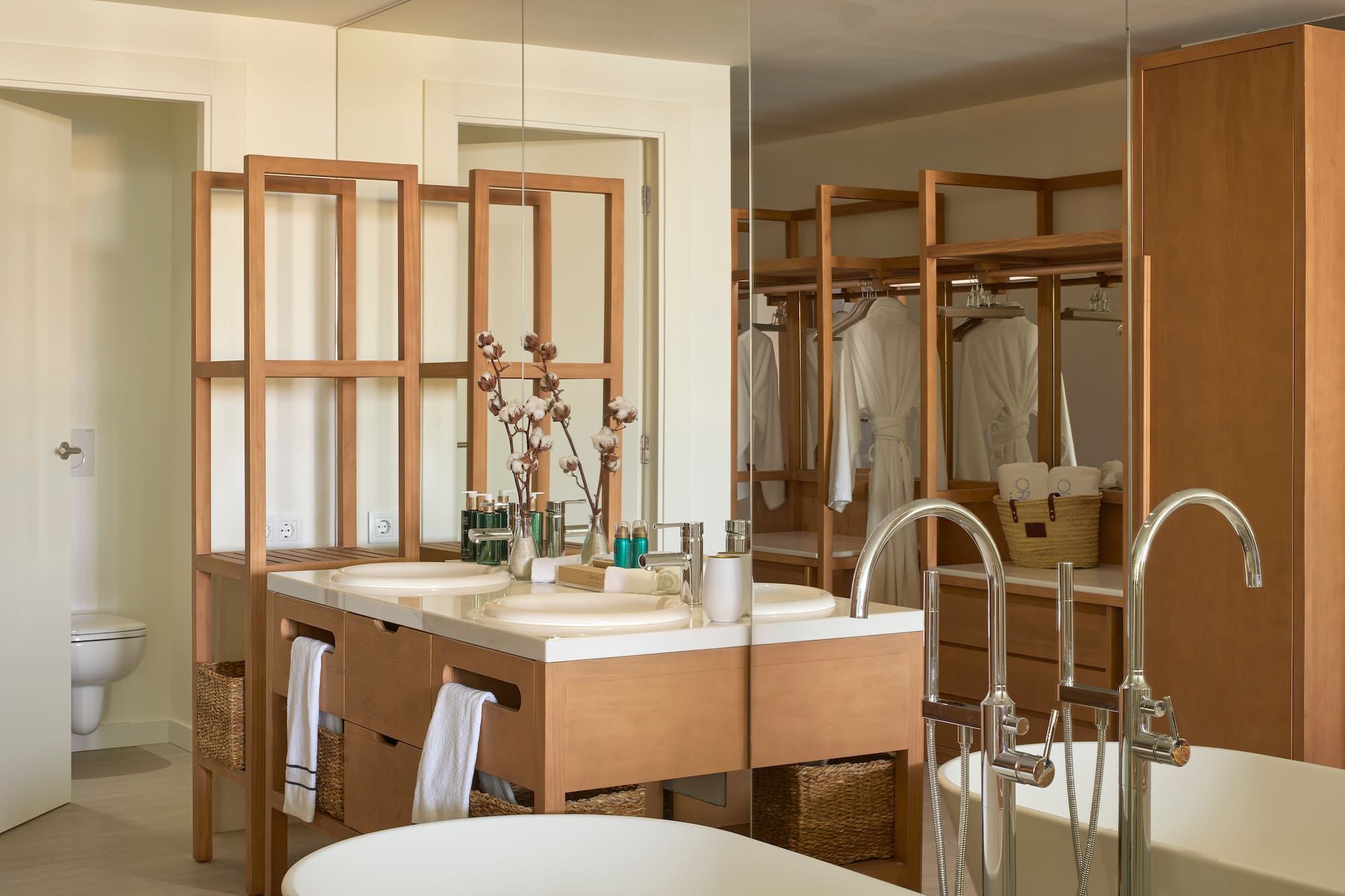 a bathroom with a large mirror and a sink
