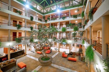 a large building with a tree in it