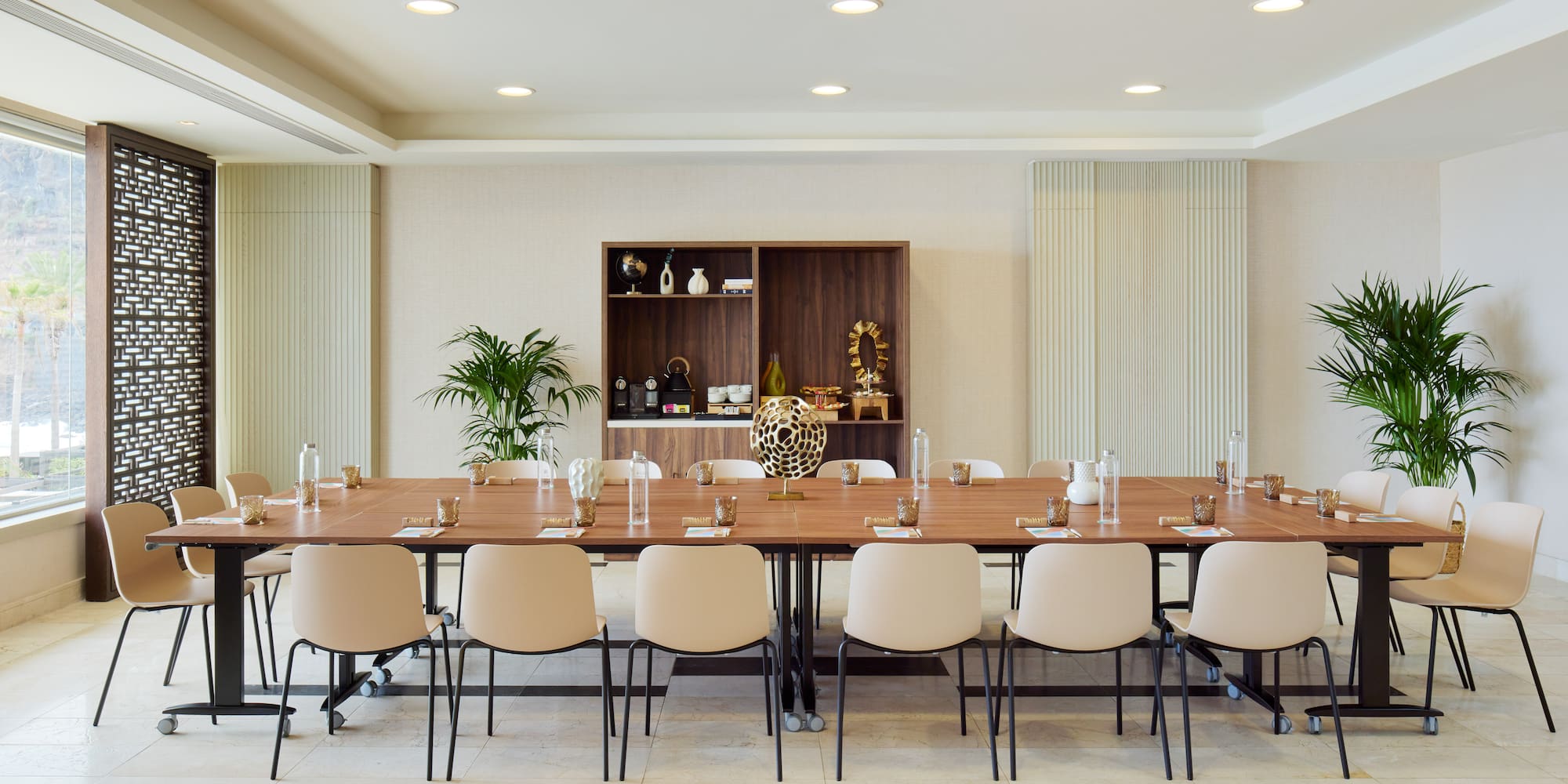a large conference room with a table and chairs