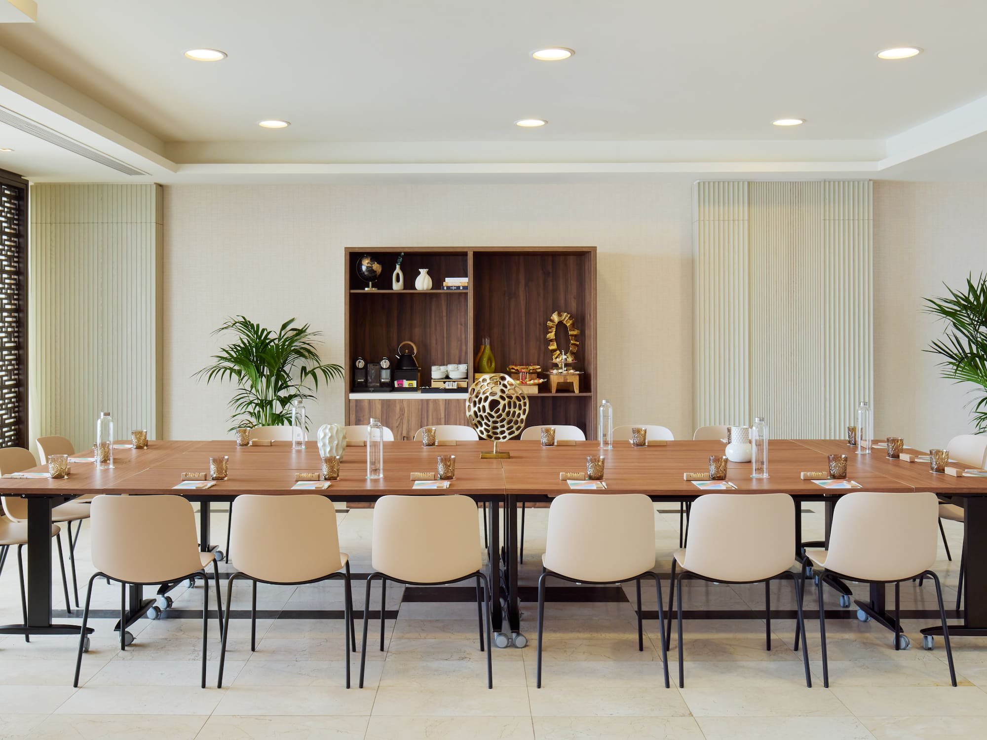 a large conference room with a table and chairs