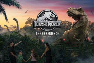 a group of people in front of a dinosaur